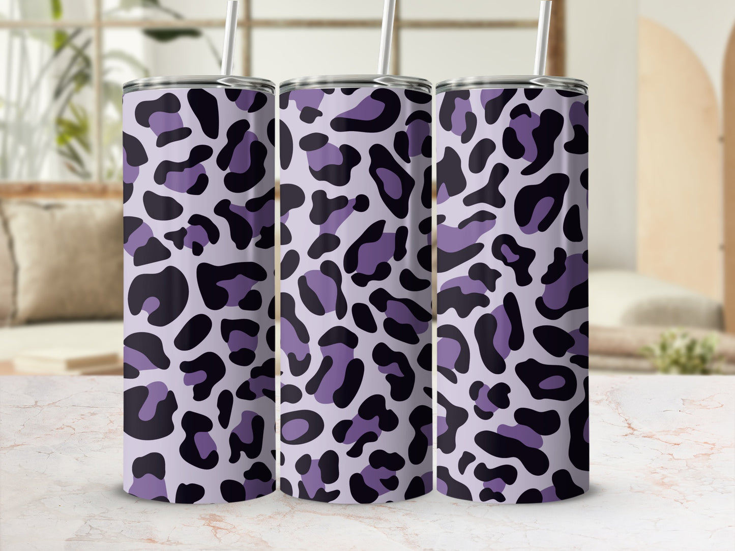 Three tumblers with a purple and black leopard print pattern.