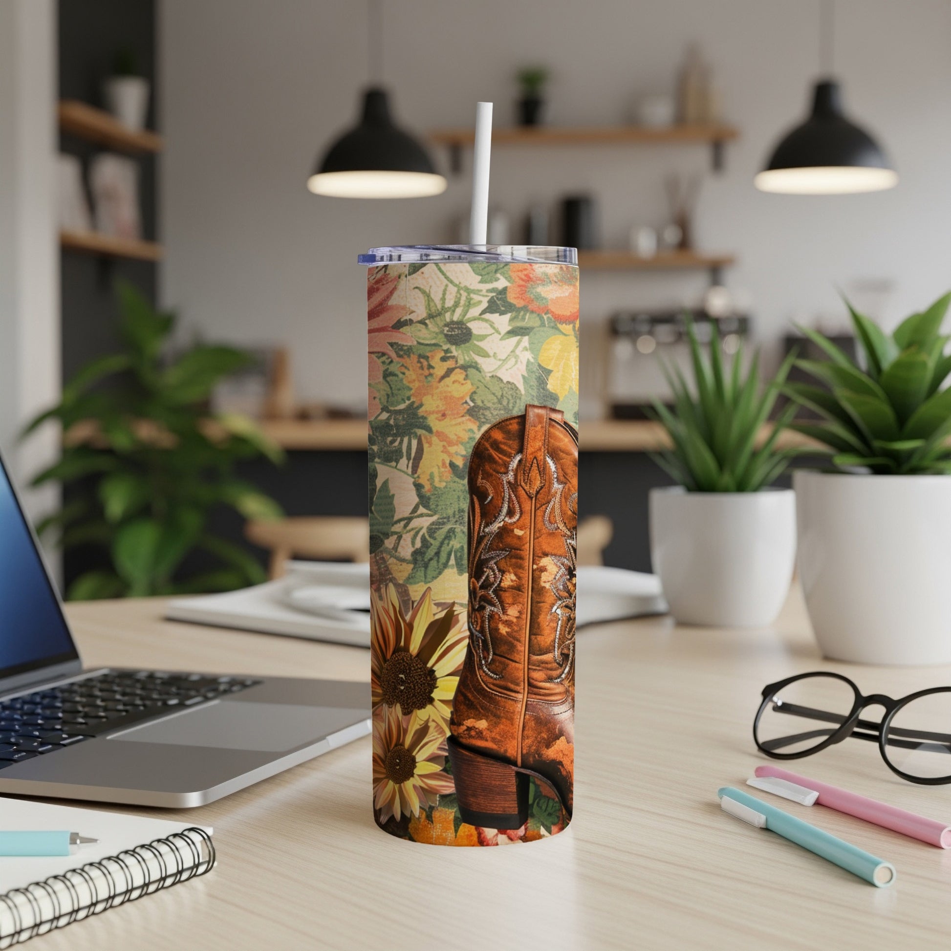 Cowboy boot and sunflower pattern on a skinny tumbler.