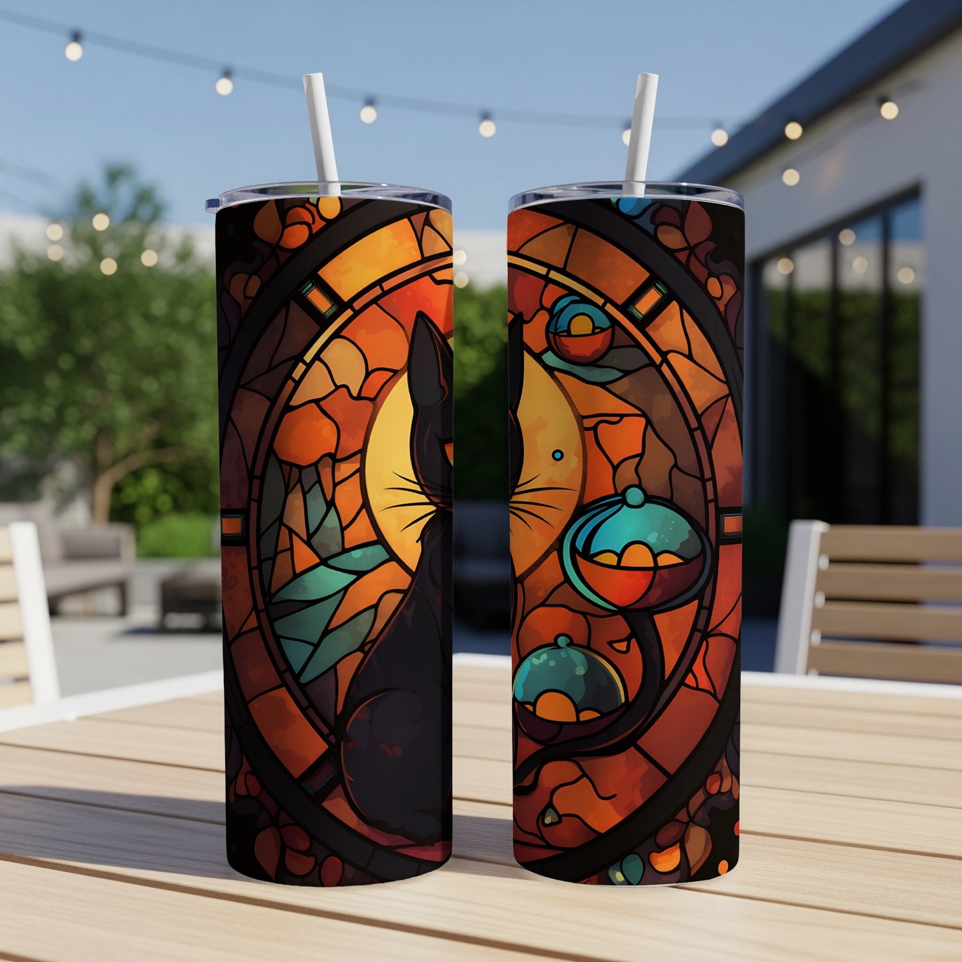 Stained glass tumbler featuring a black cat in a circular, mosaic design.