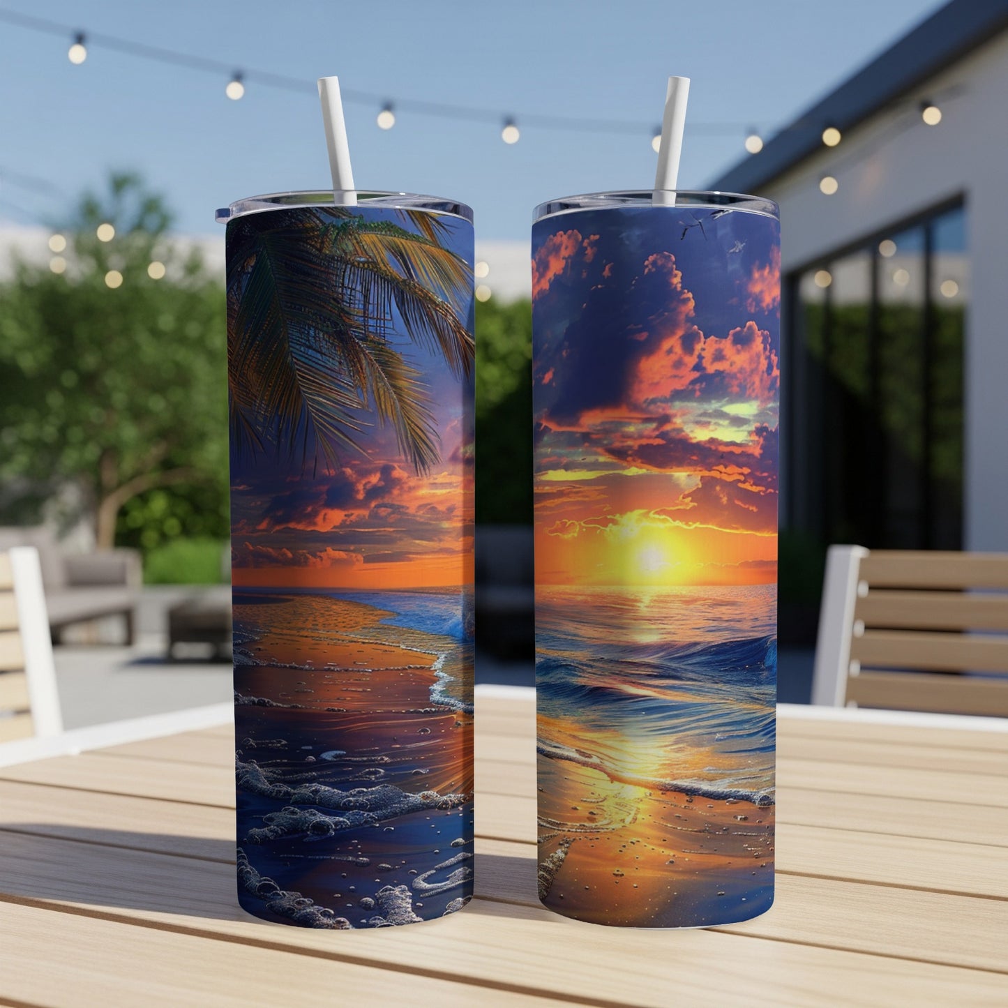 Two tumblers featuring a vibrant sunset over the ocean with palm trees.