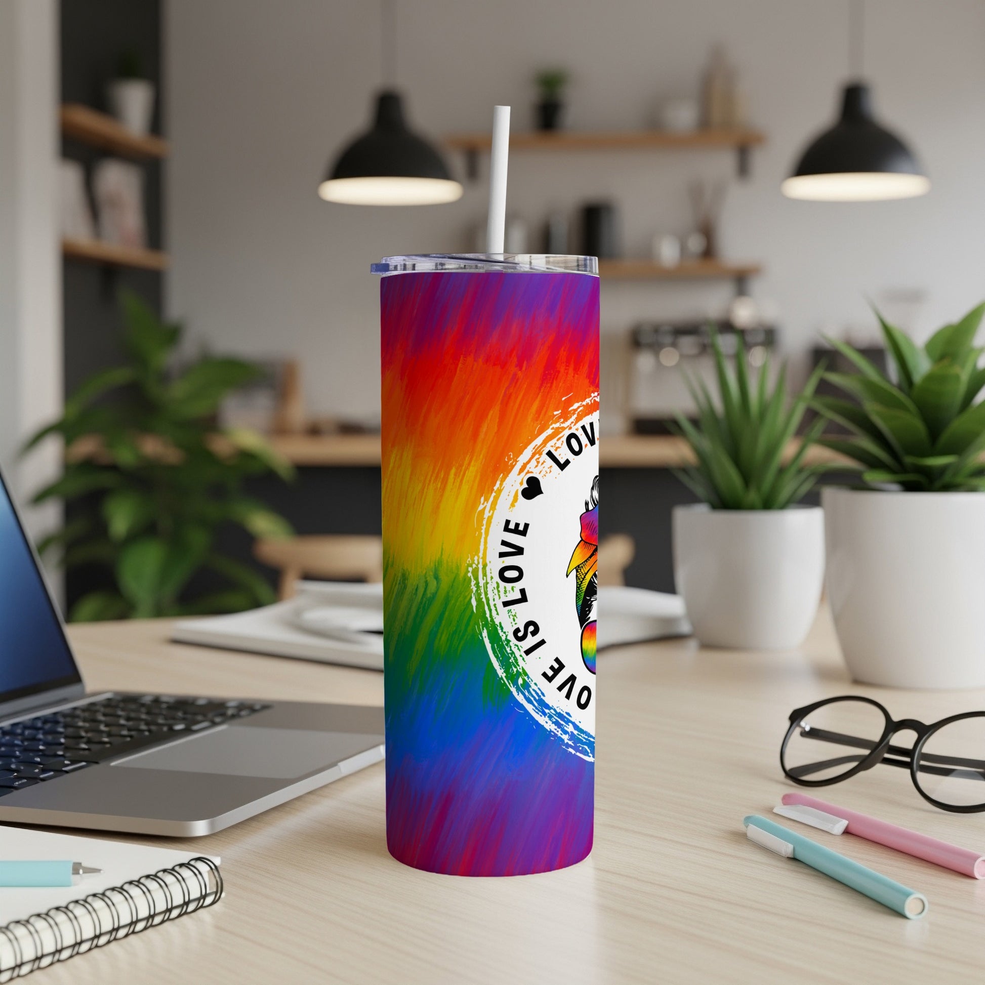 Rainbow tie-dye tumbler with "Love is Love" logo and straw.