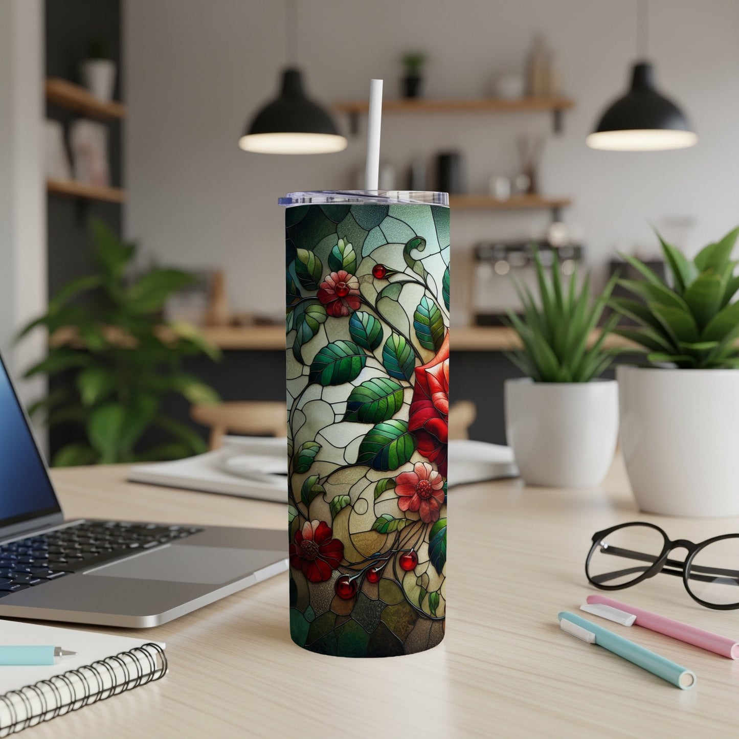 Stained glass tumbler with red roses and green leaves.