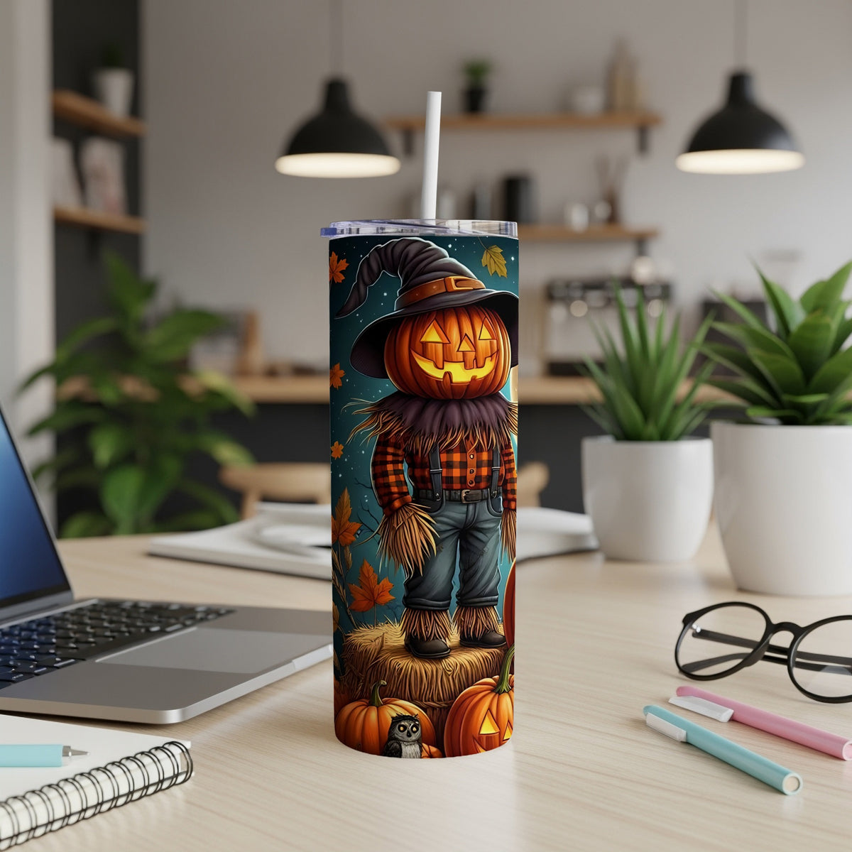 Halloween tumbler with pumpkin scarecrow, witch hat, plaid shirt, and pumpkins.