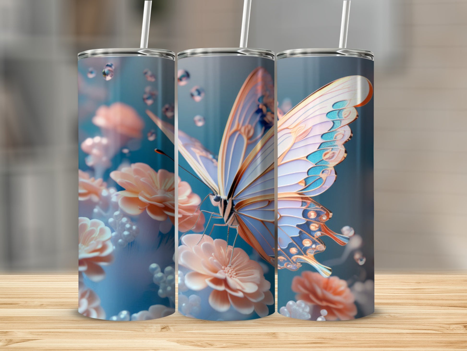 Three tumblers with a butterfly and floral design.