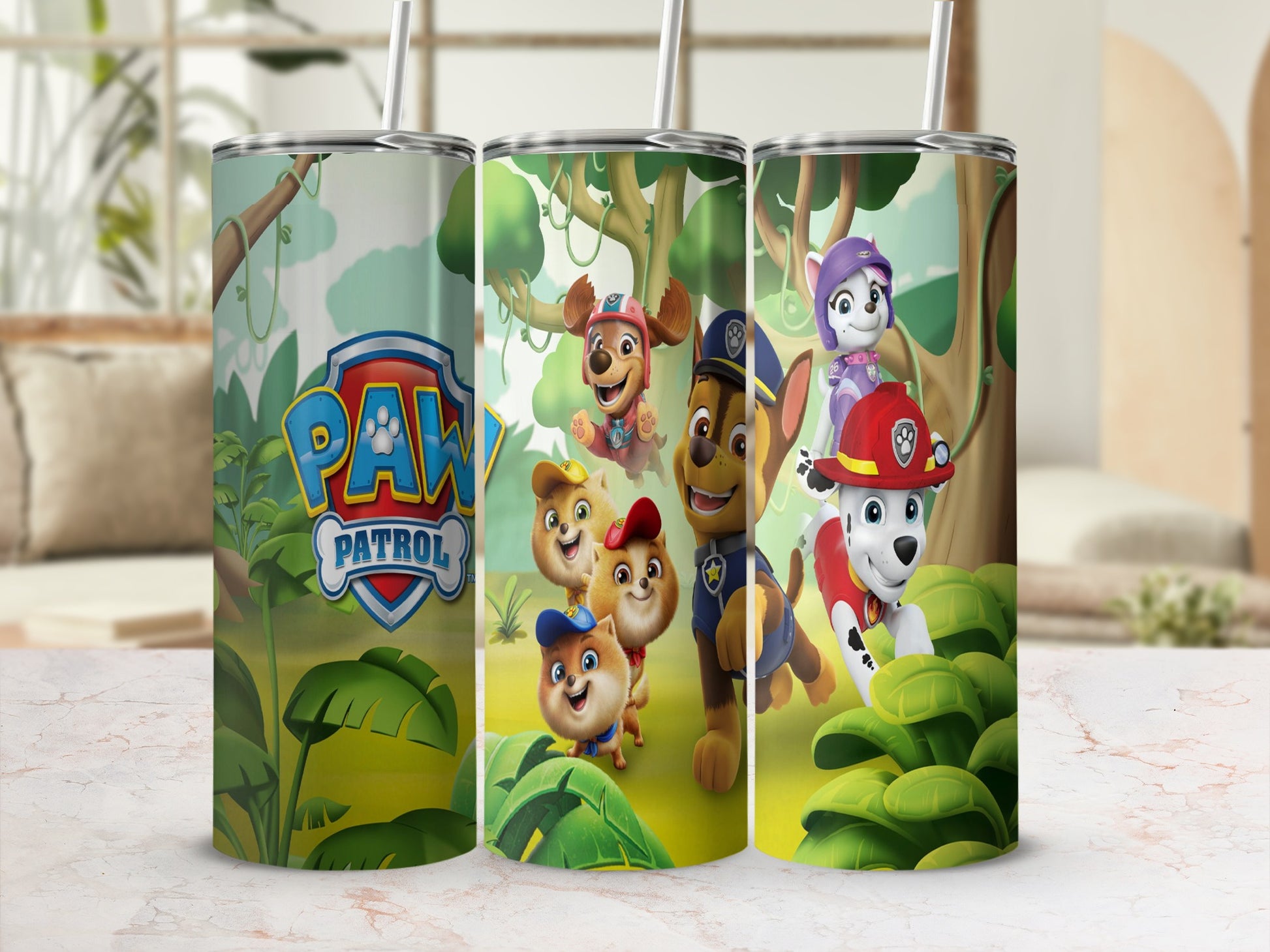 Paw Patrol characters Chase, Marshall, Rubble, Skye, and Everest on a green tumbler.