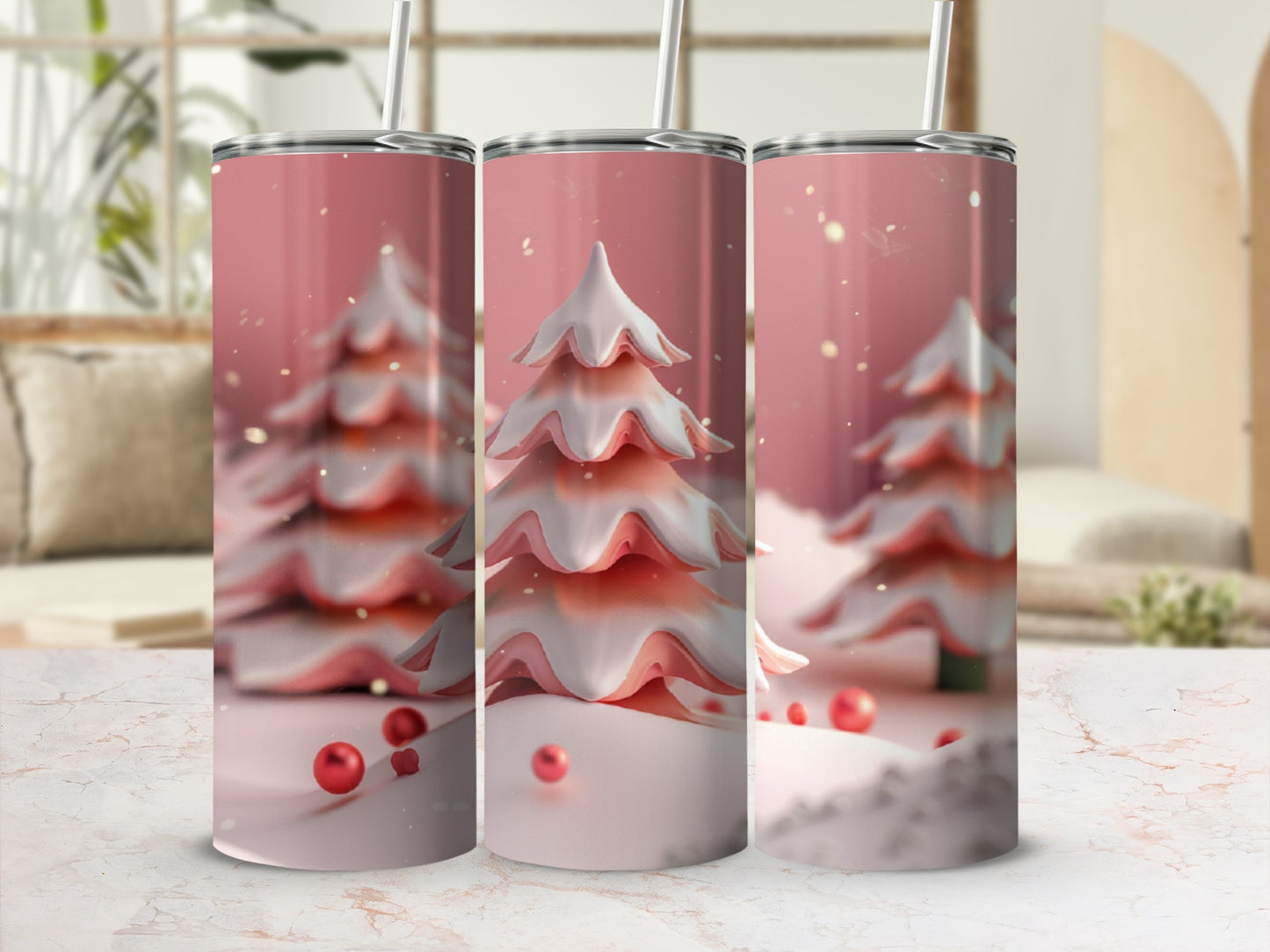 Three pink frosted Christmas trees with red ornaments on a white surface.