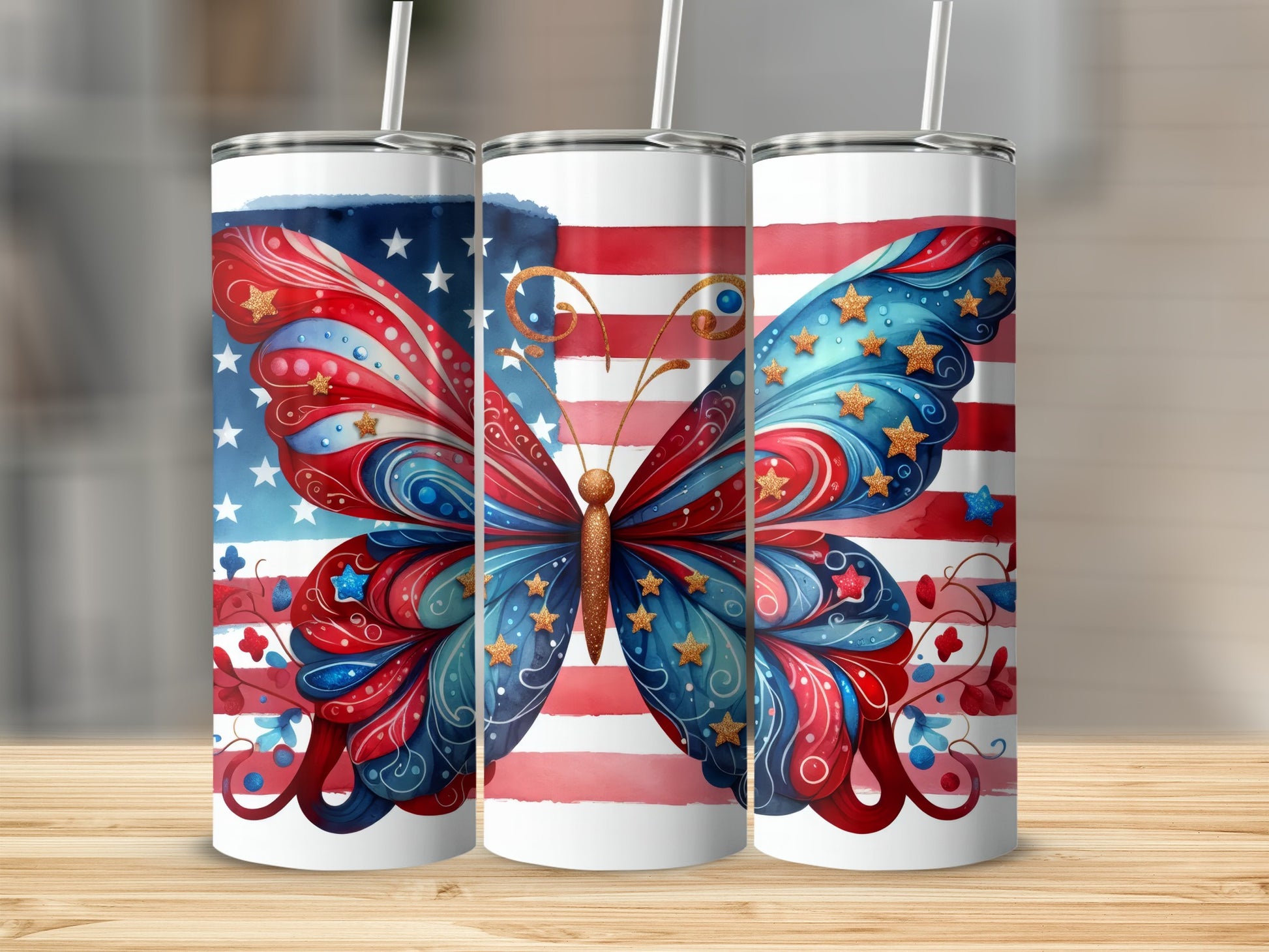 Three tumblers with patriotic butterfly and star designs.