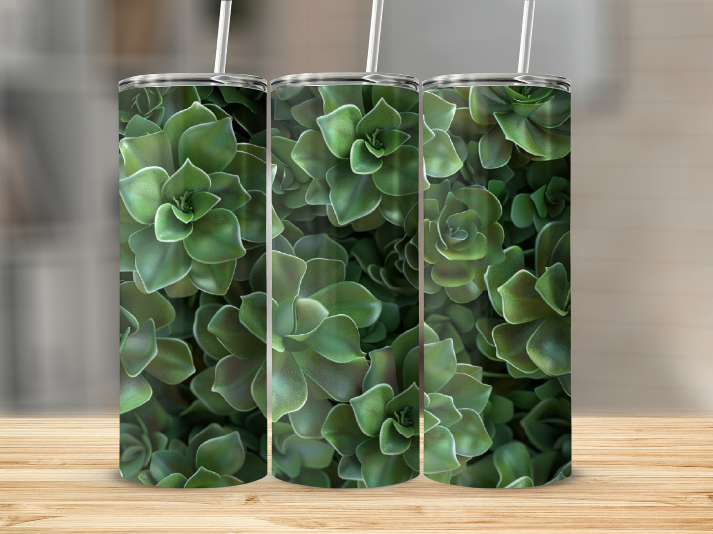 Close-up of a succulent plant pattern on three tumblers.