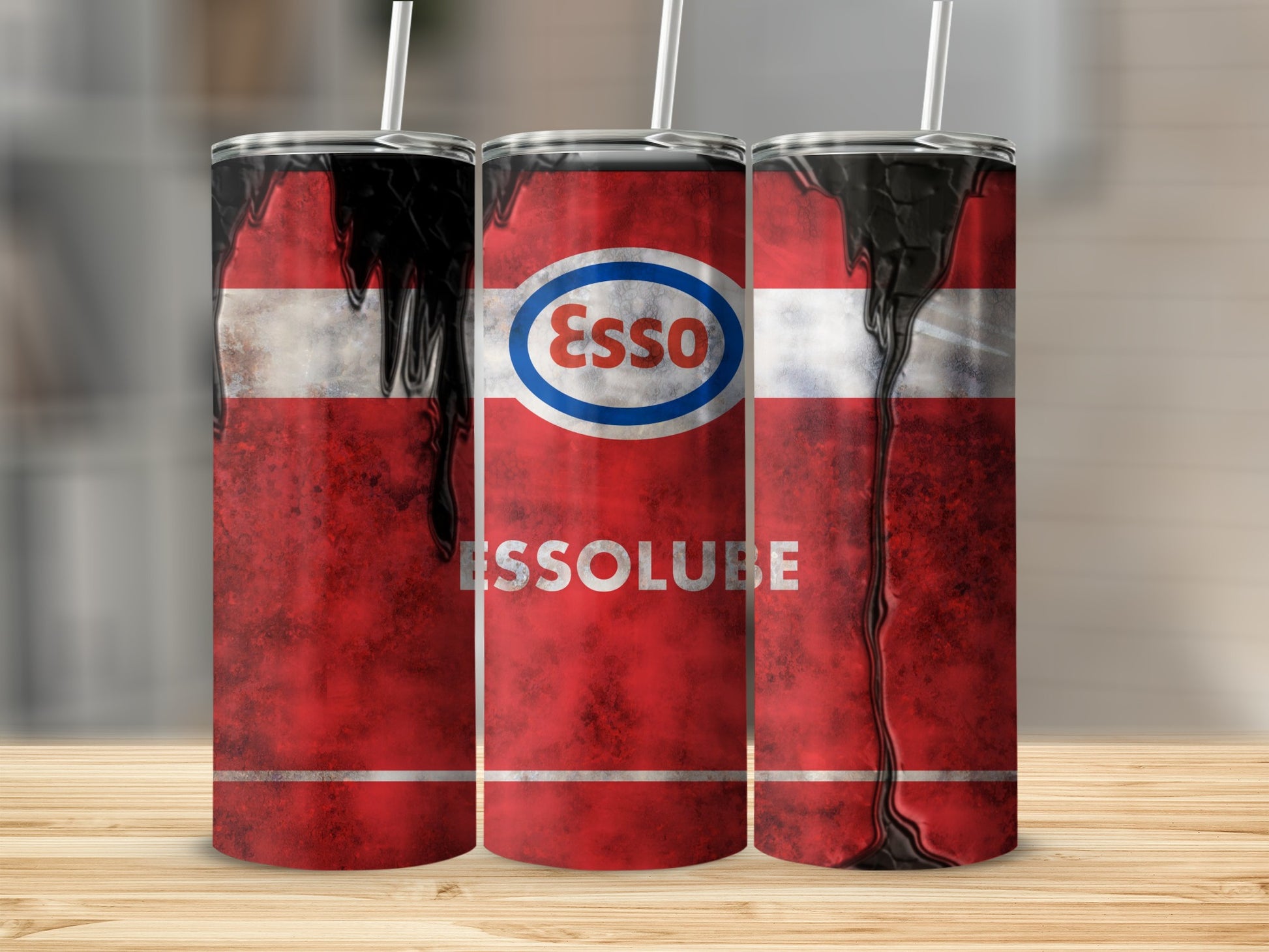 Esso logo on distressed red tumbler with black liquid dripping.