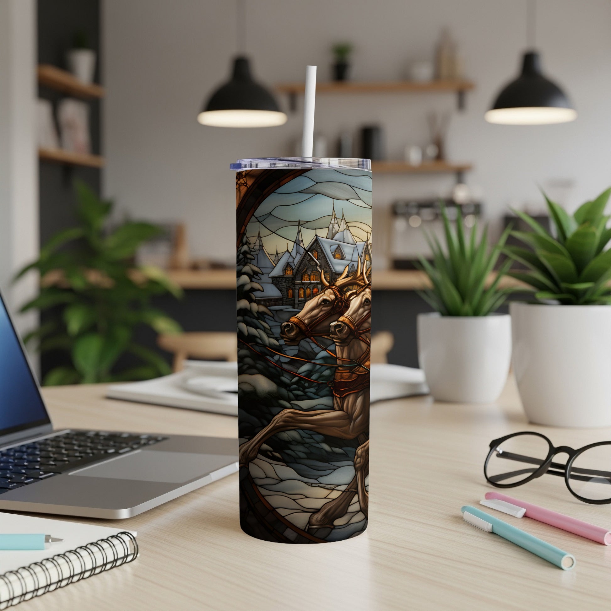 Stained glass design on a tumbler with horses pulling a sleigh.
