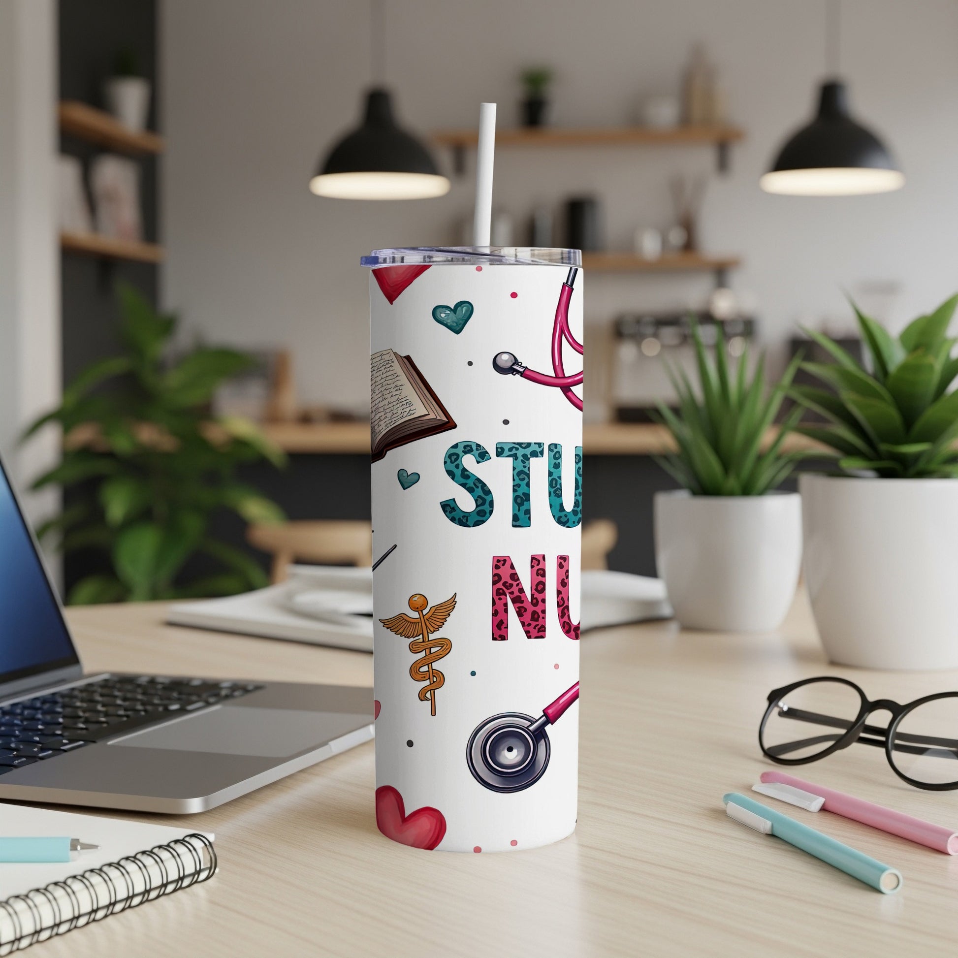 White tumbler with "STUD NURSE" in colorful leopard print and medical icons.