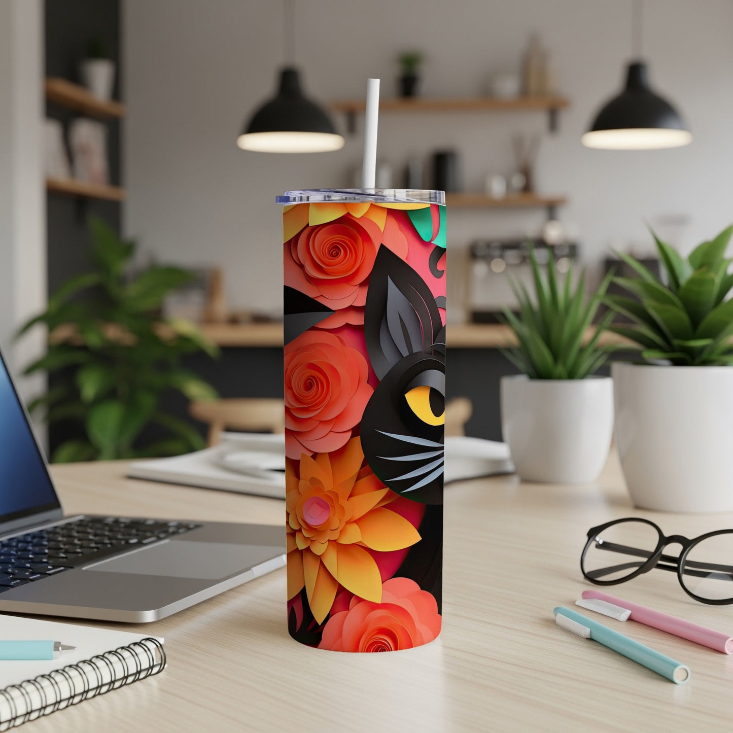 Tumbler with black cat and floral paper cut design, featuring orange and yellow flowers.