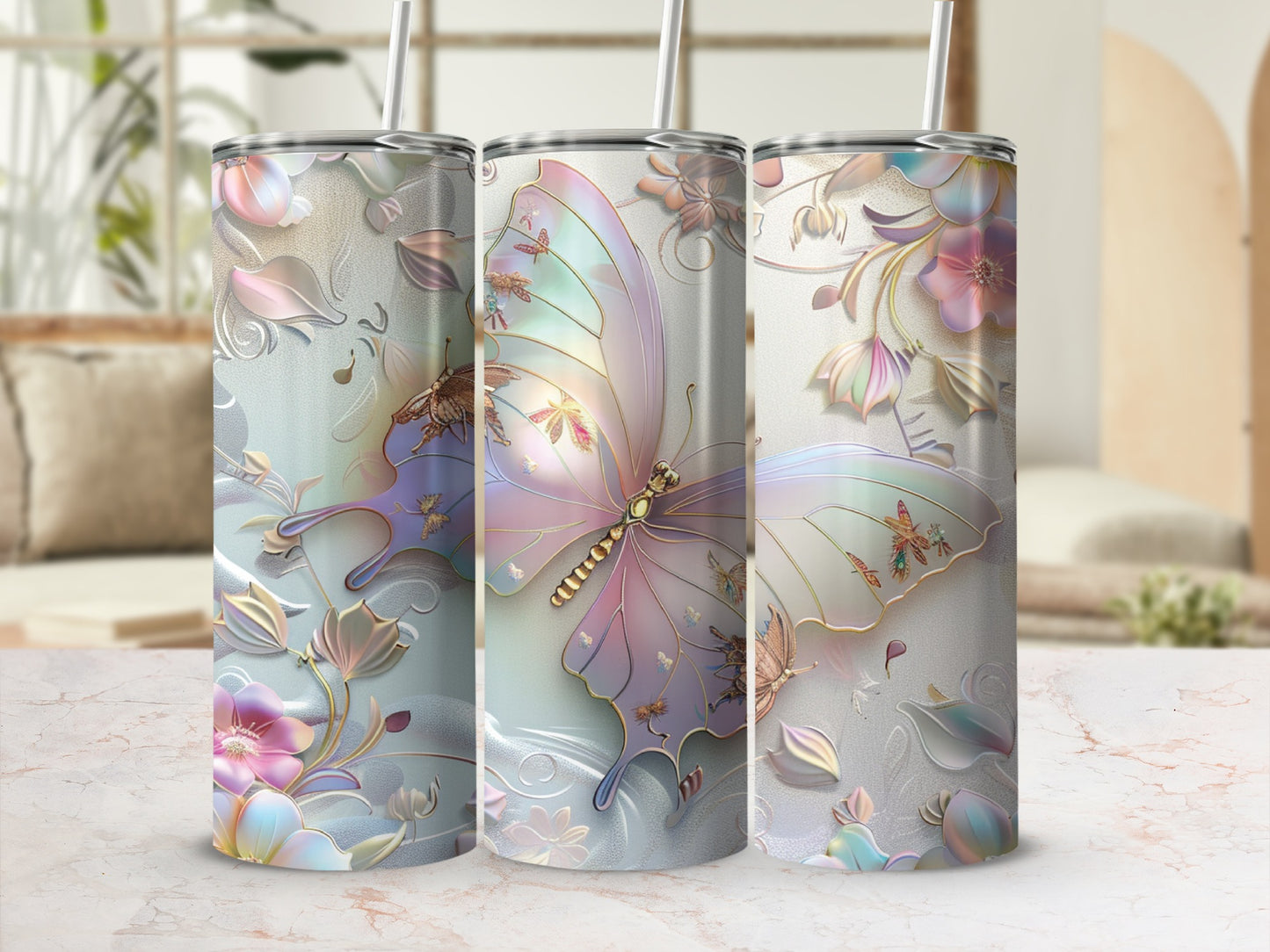 Three iridescent tumblers with butterfly and floral designs.