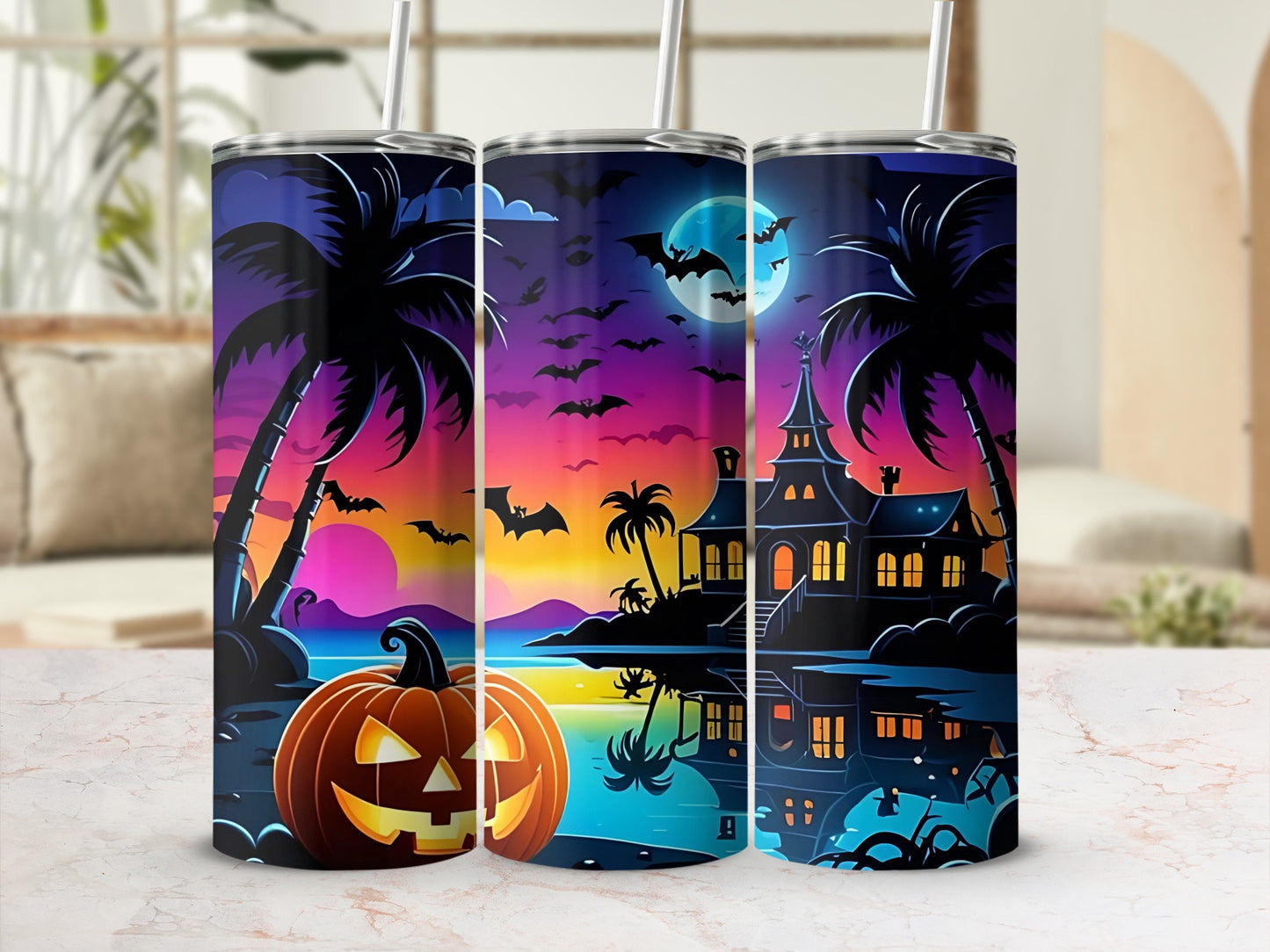 Three tumblers featuring a Halloween beach scene with a jack-o'-lantern, haunted house, and bats.