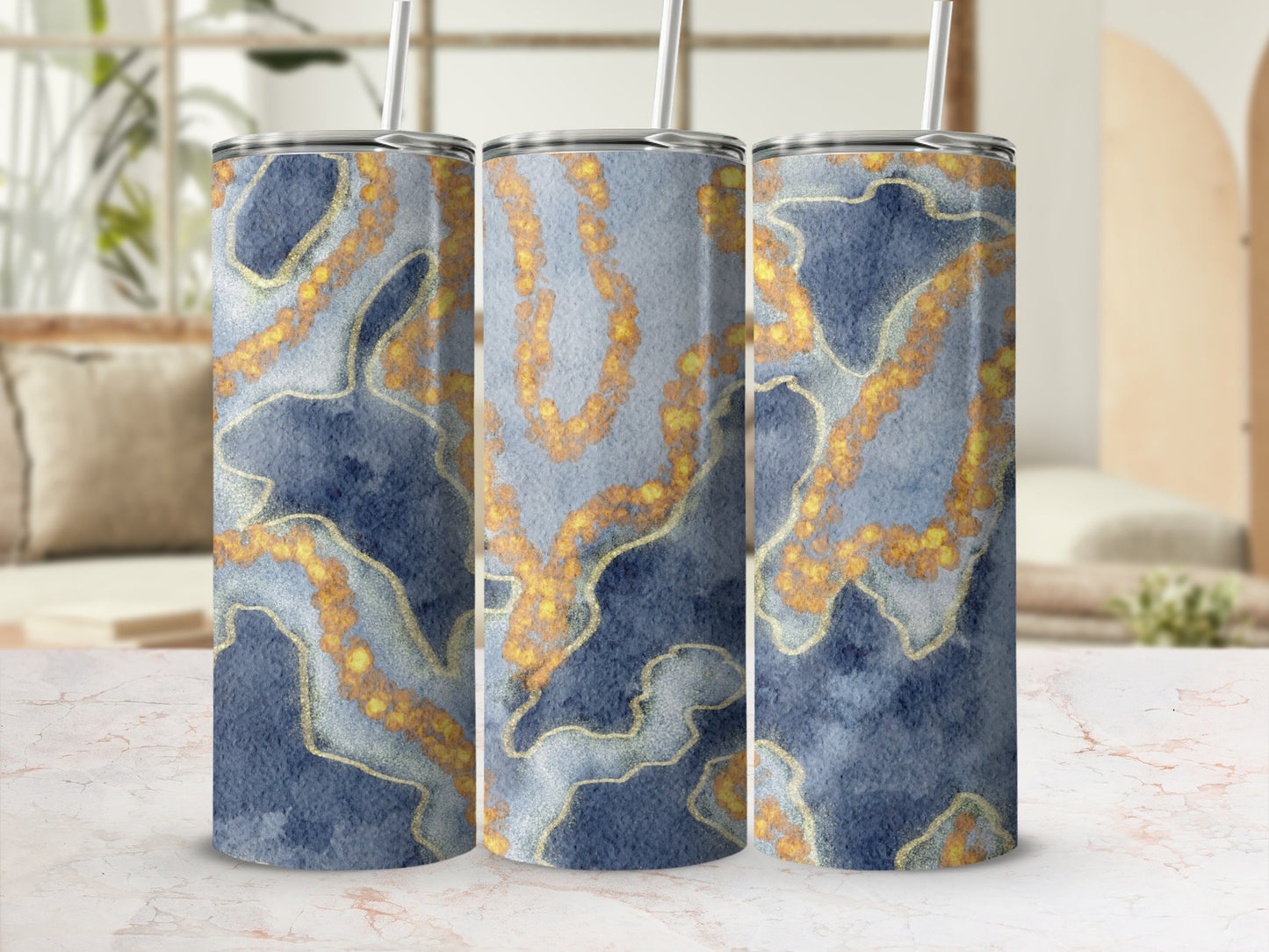 Three tumblers with blue and gold marbled pattern.