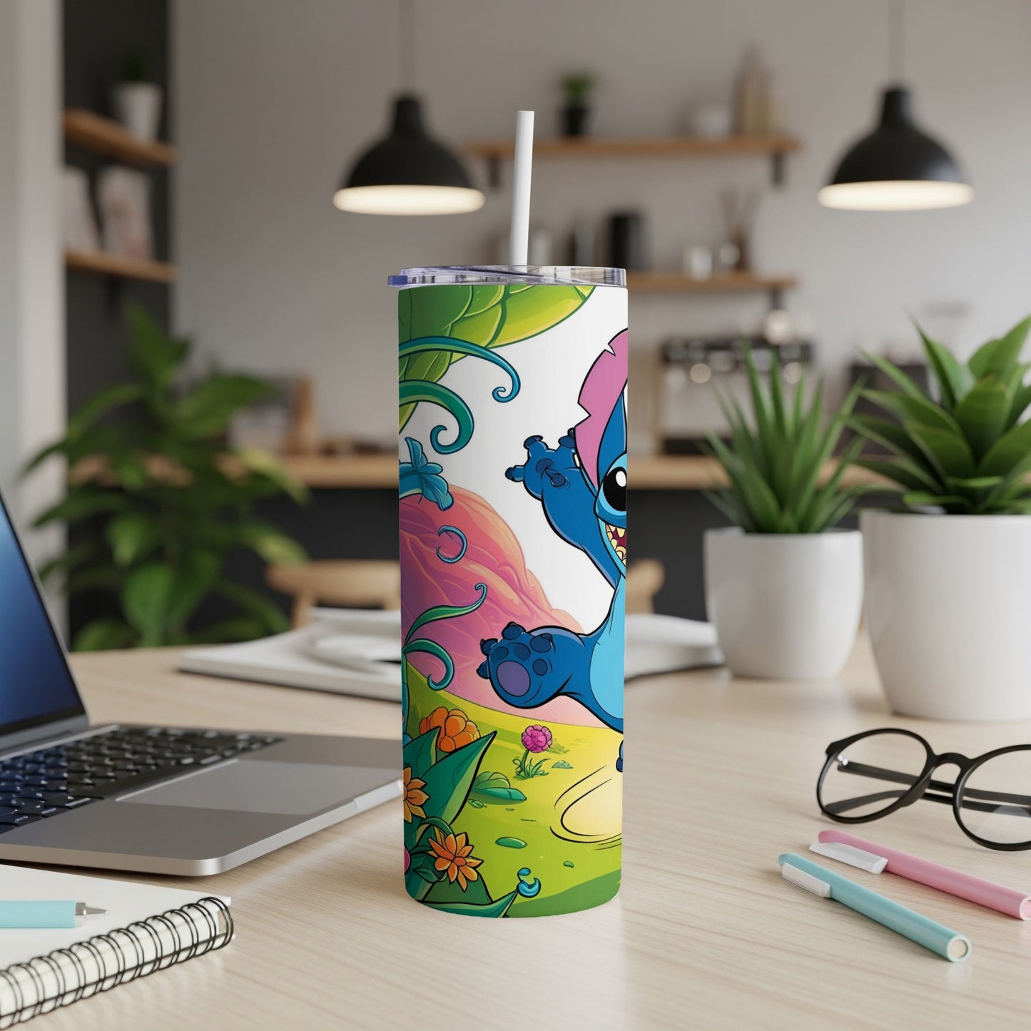 Stitch character on a colorful tropical tumbler with a white straw.