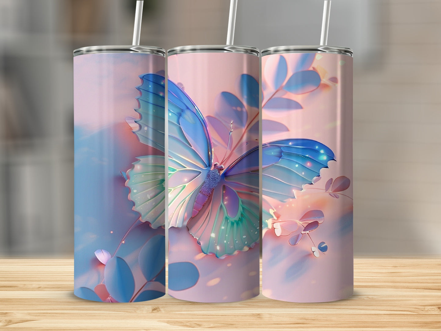 Three tumblers with a butterfly and floral design.