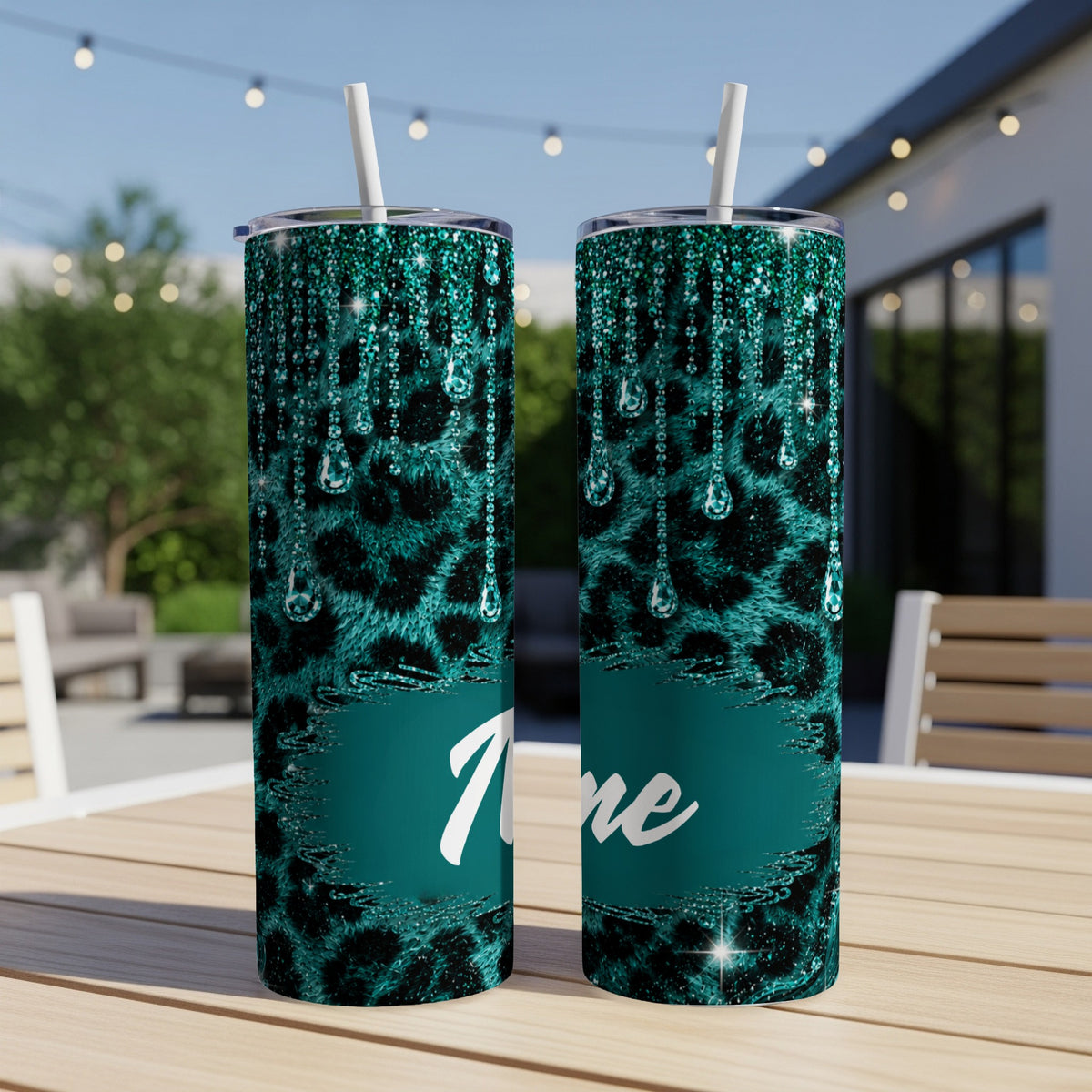 Two teal glitter leopard print tumblers with dripping gem design and white name text.