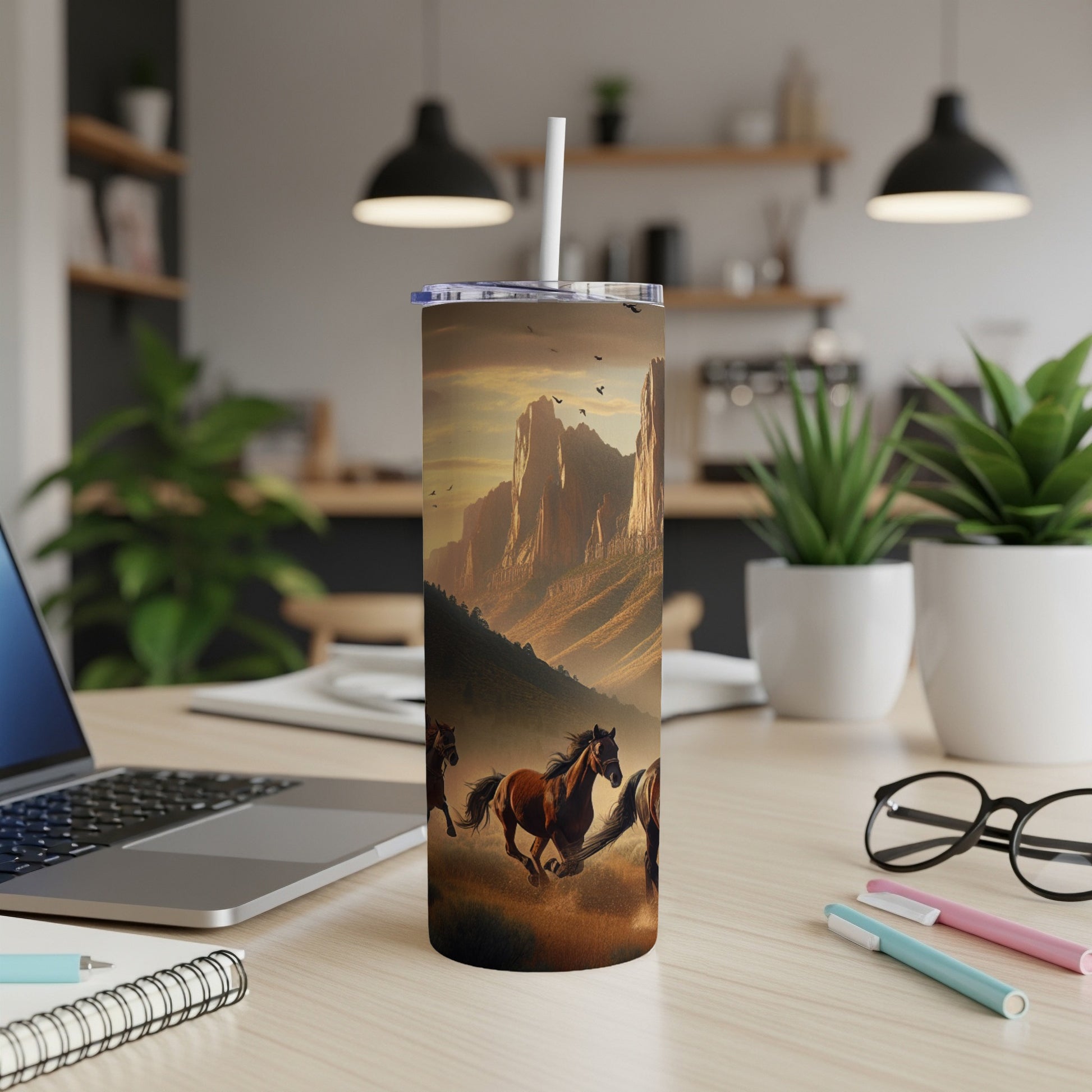 Tumbler featuring running horses in a desert canyon landscape.
