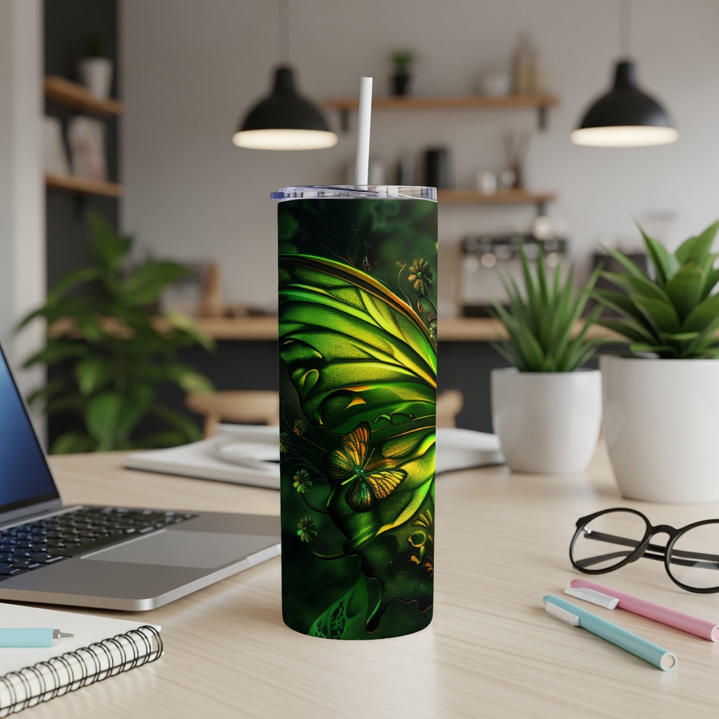 Green iridescent butterfly pattern on a dark forest background, on a travel tumbler.
