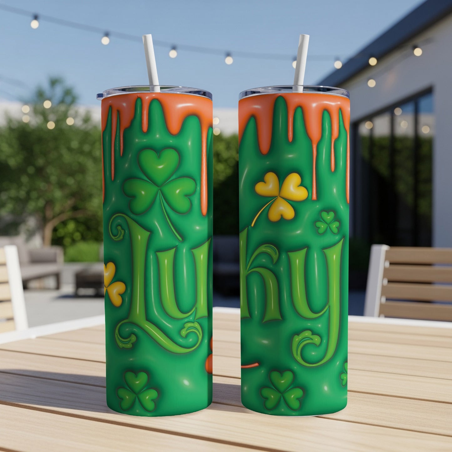 Two green tumblers with orange drip and "Lucky" text, featuring shamrocks.