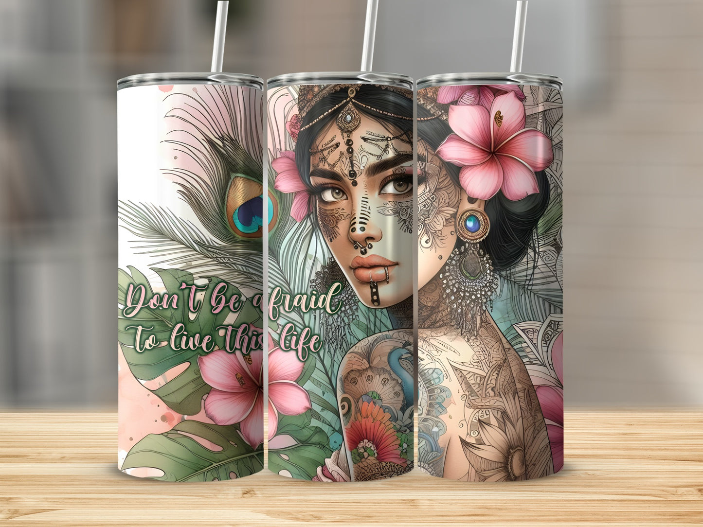 Woman with floral tattoos and peacock feather artwork on tumbler.