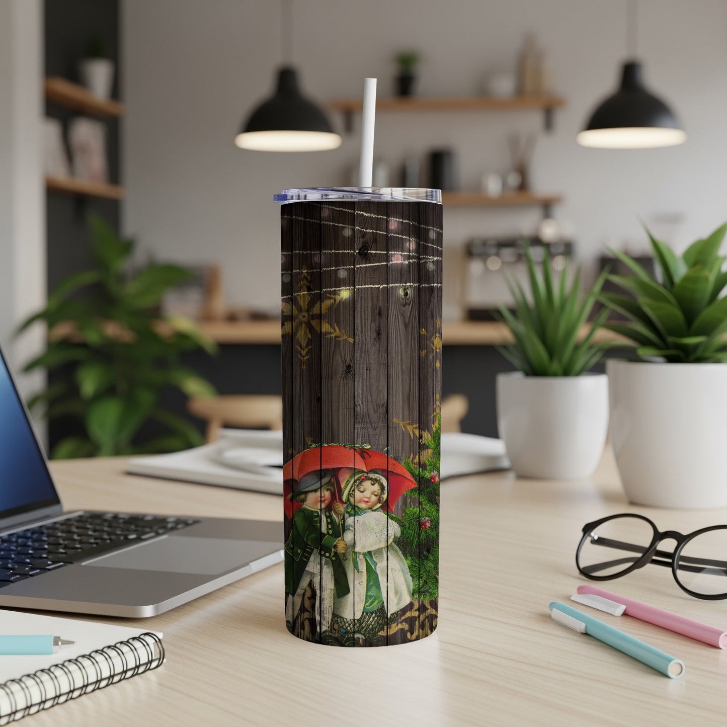 Christmas tumbler with vintage couple under umbrella, snowflakes, and string lights on wood grain.