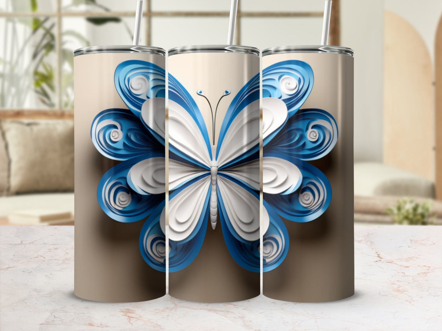Three tumblers featuring a layered blue and white butterfly design.