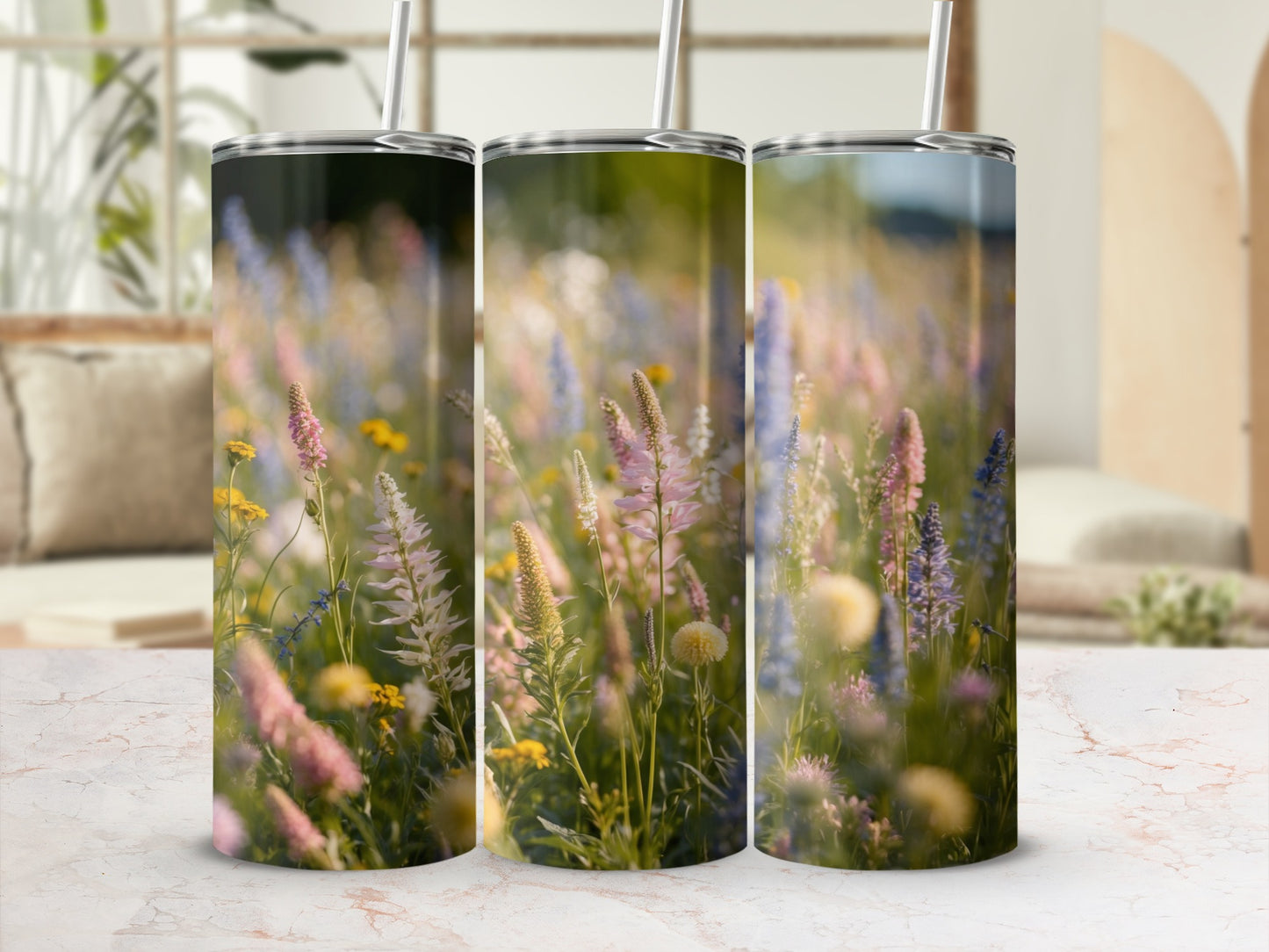 Three tumblers with a pastel floral meadow design.