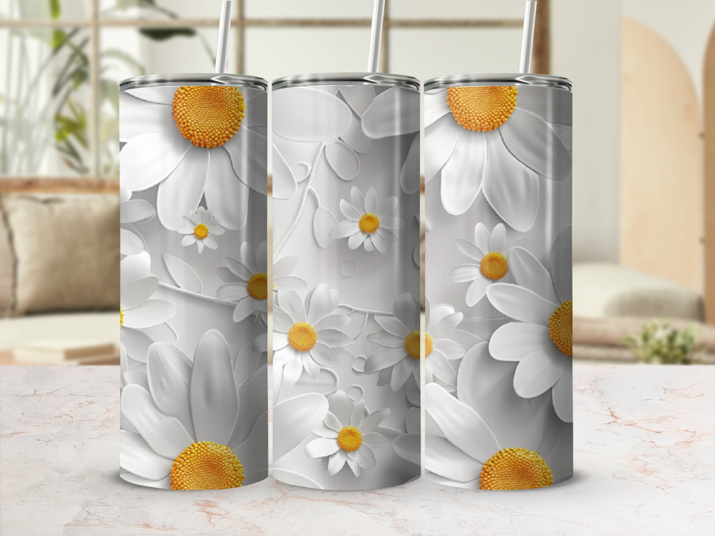 White daisy floral pattern on a set of three tall, cylindrical tumblers.