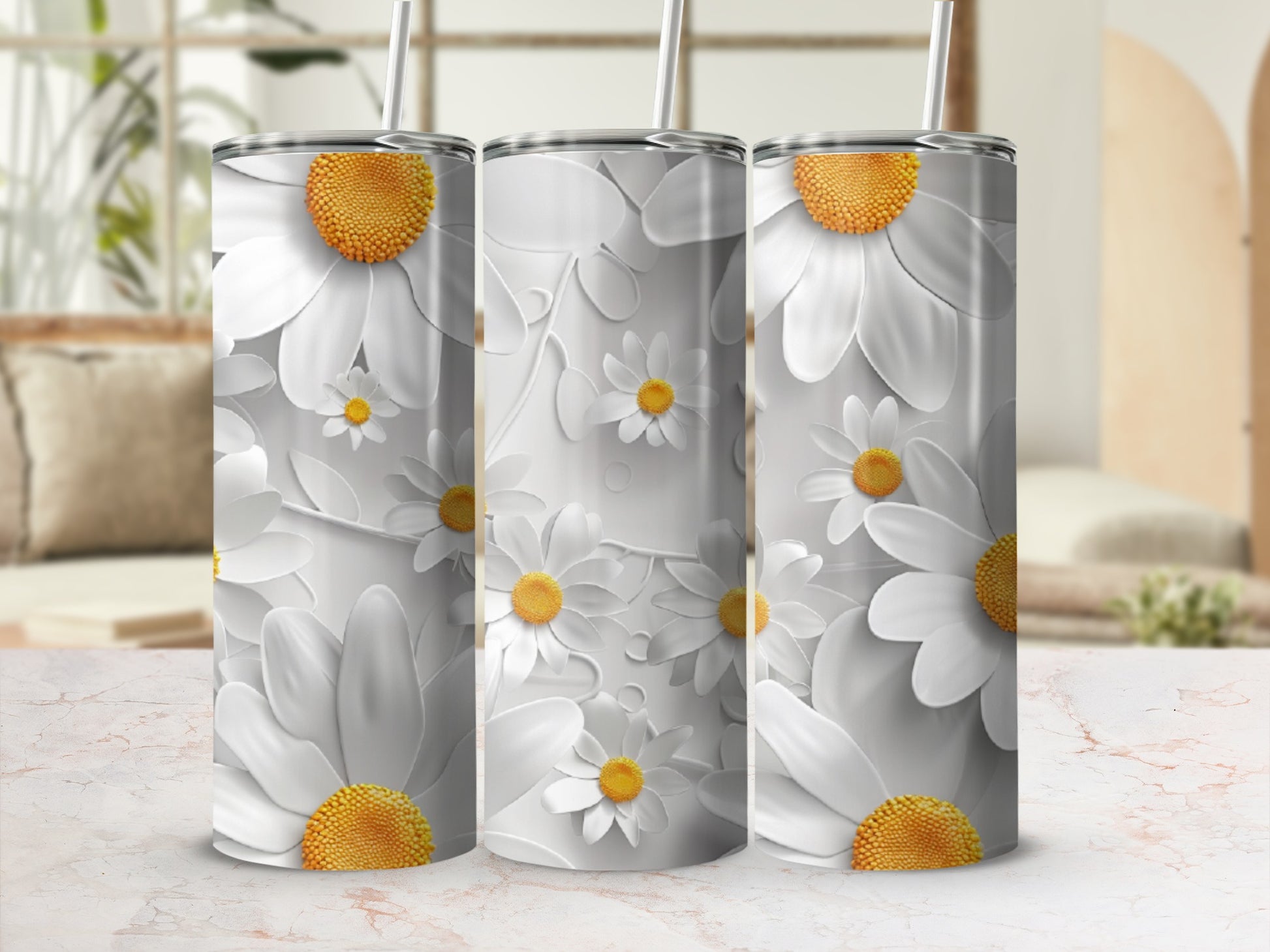 White daisy floral pattern on a set of three tall, cylindrical tumblers.