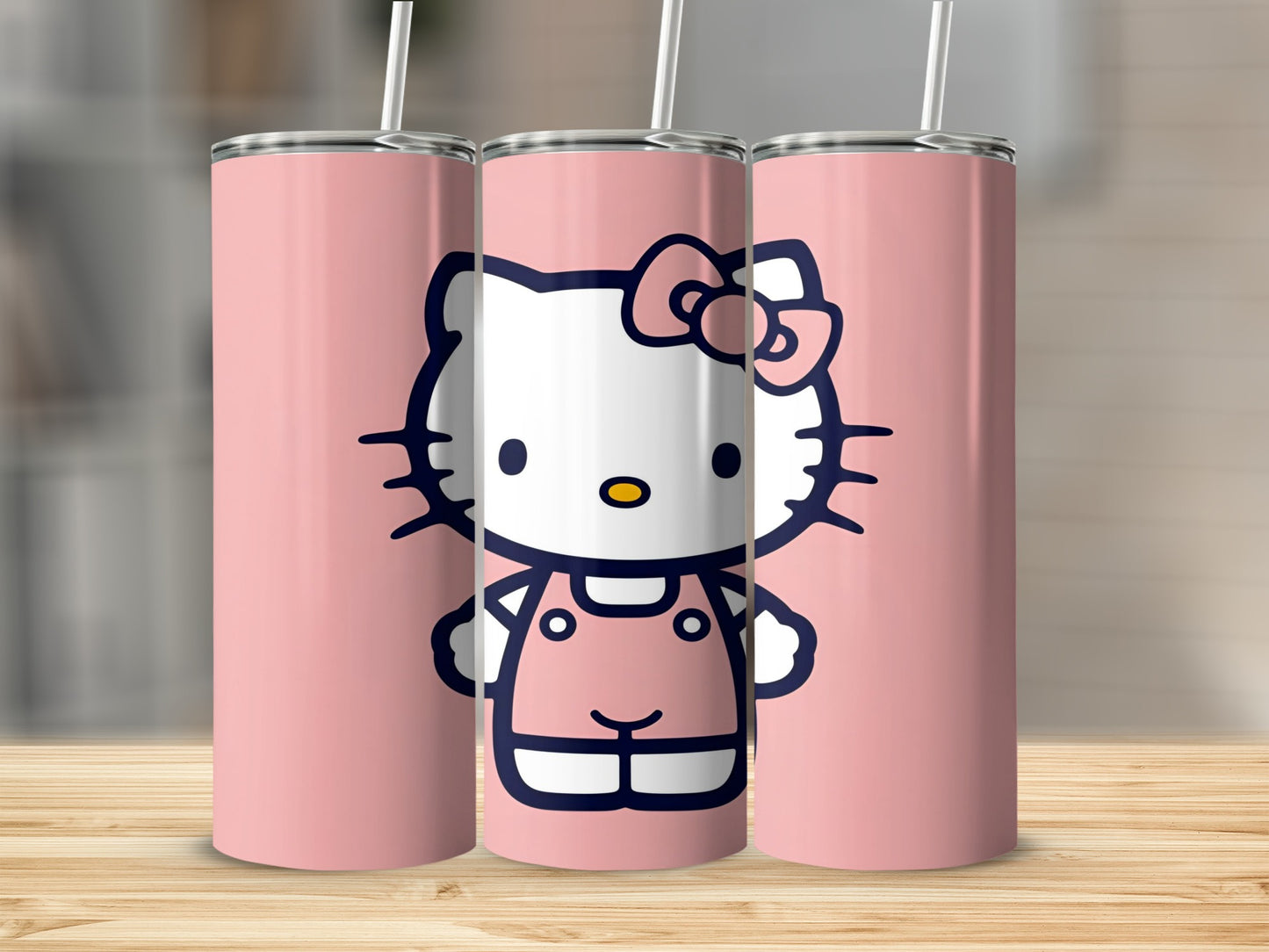 Hello Kitty in pink overalls on a pink tumbler.