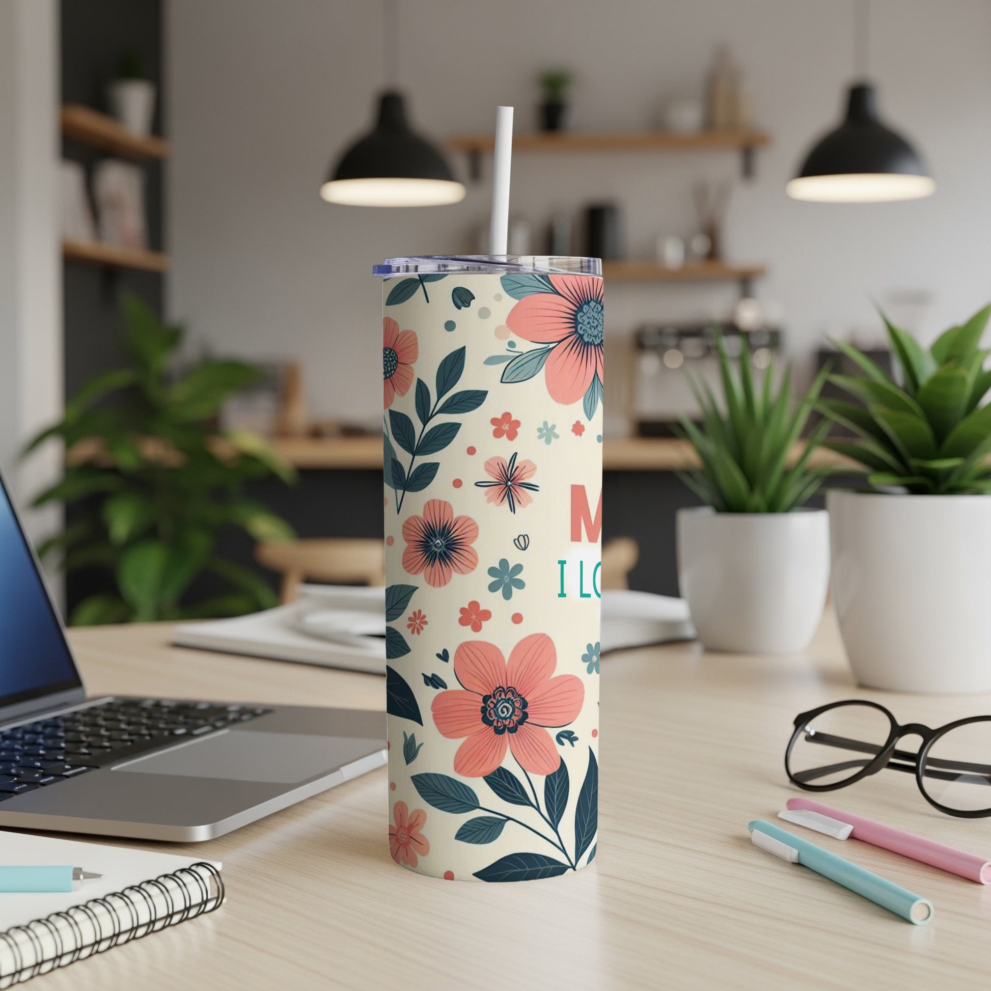 Cream tumbler with floral pattern and "Mom I Love You" text.