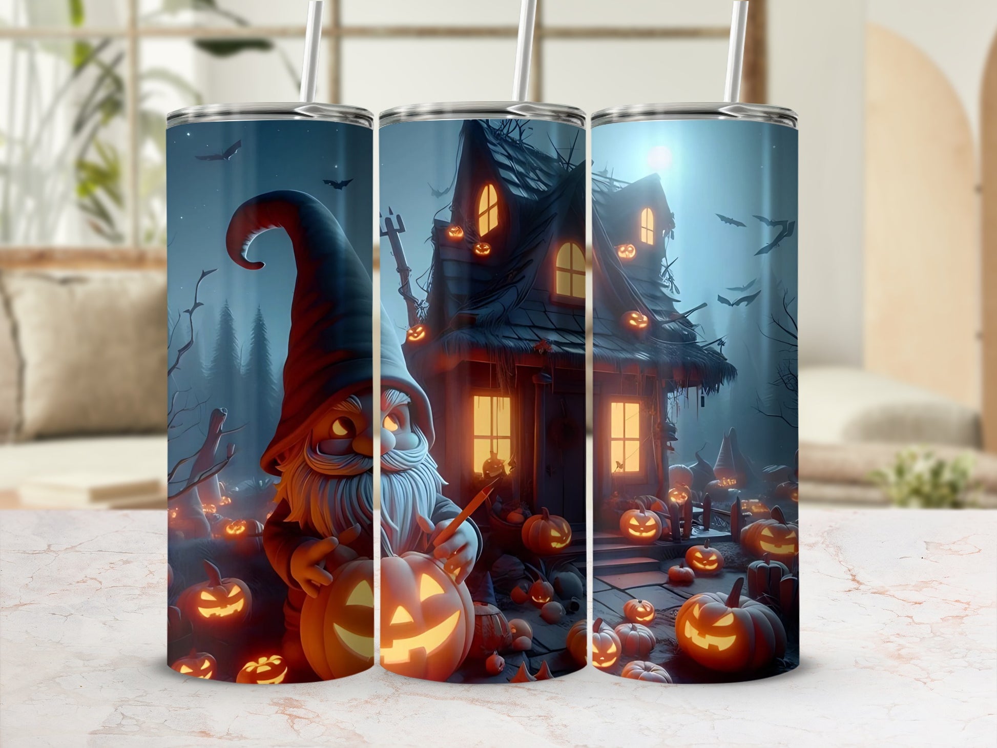 Halloween gnome and haunted house design on three tumblers with straws.