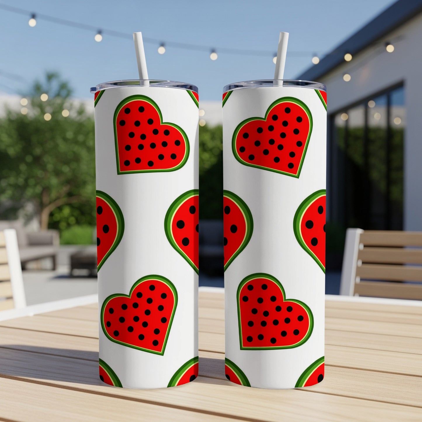 Two tall tumblers with a repeating watermelon heart pattern.