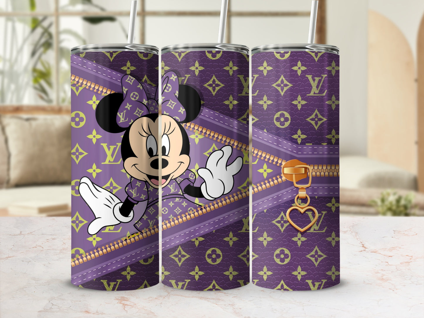 Purple tumbler with Minnie Mouse and Louis Vuitton pattern.