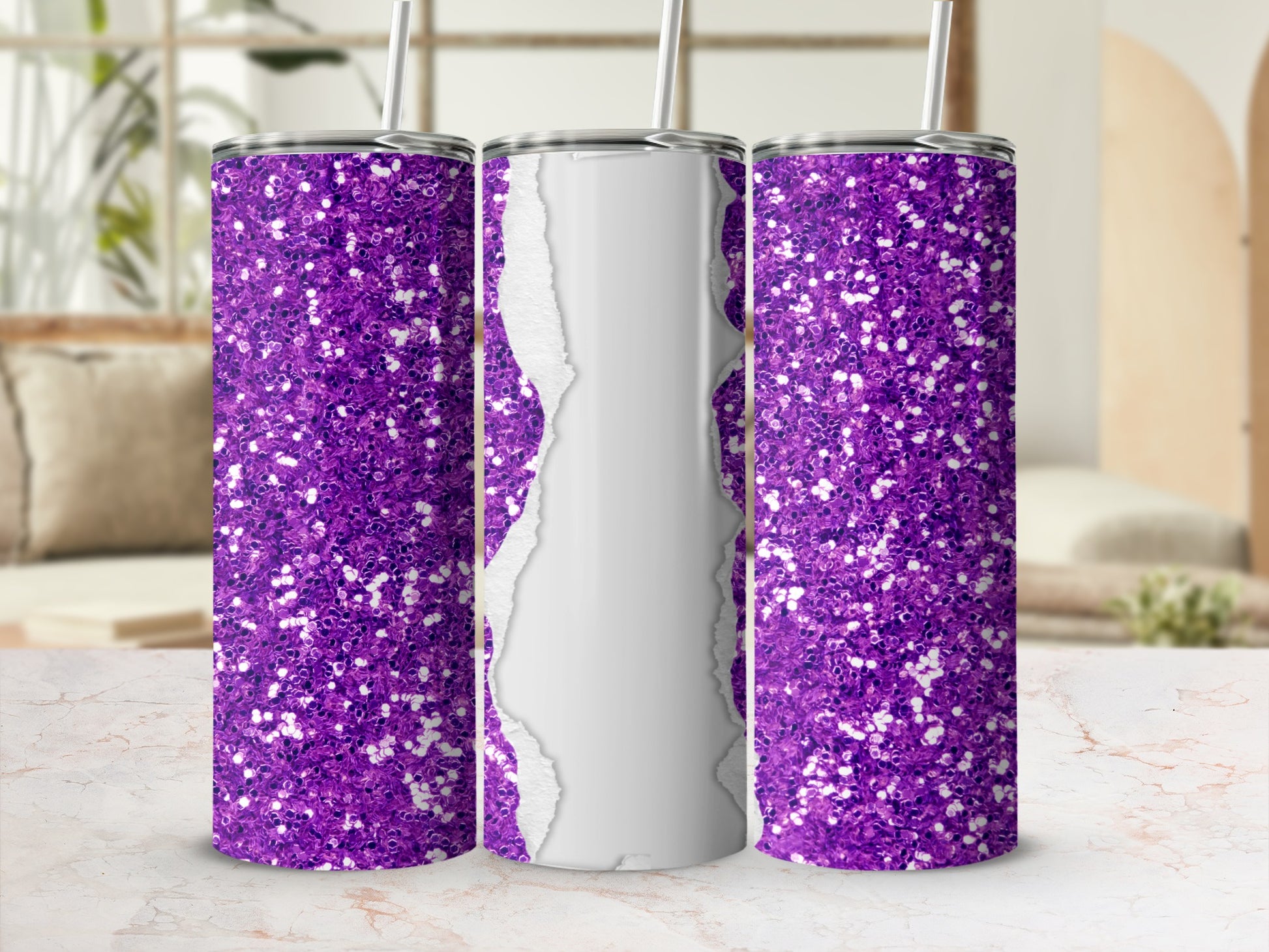 Purple glitter tumbler with a torn paper effect on a marble countertop.