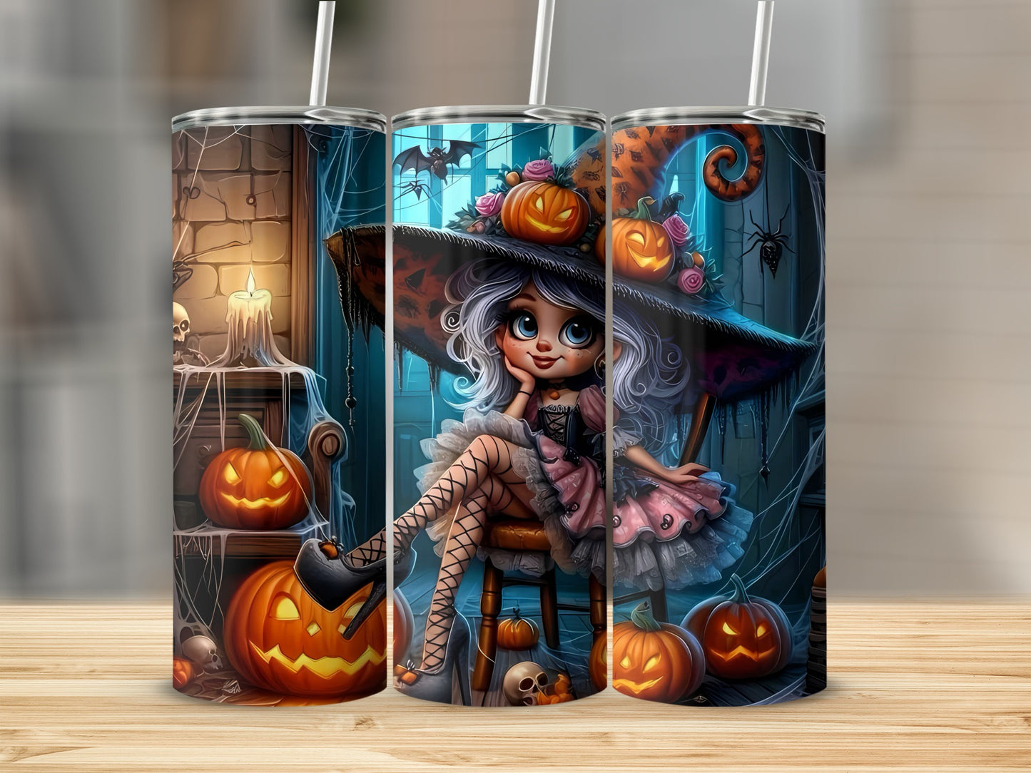 Three tumblers with a Halloween theme featuring a witch, pumpkins, bats, and spiders.