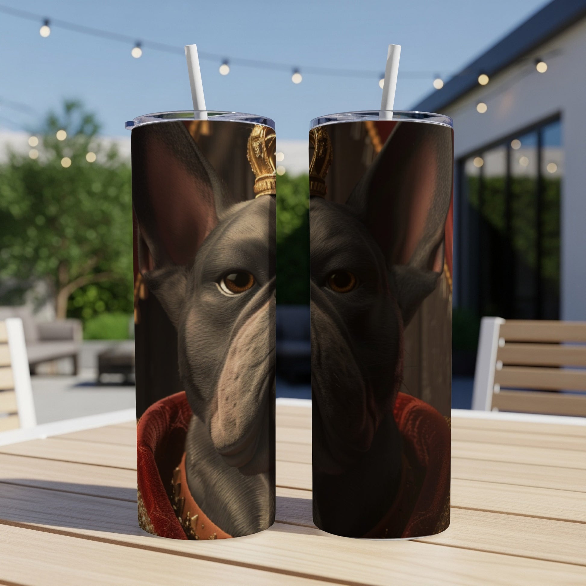 French Bulldog wearing crown and regal robe on a tumbler.