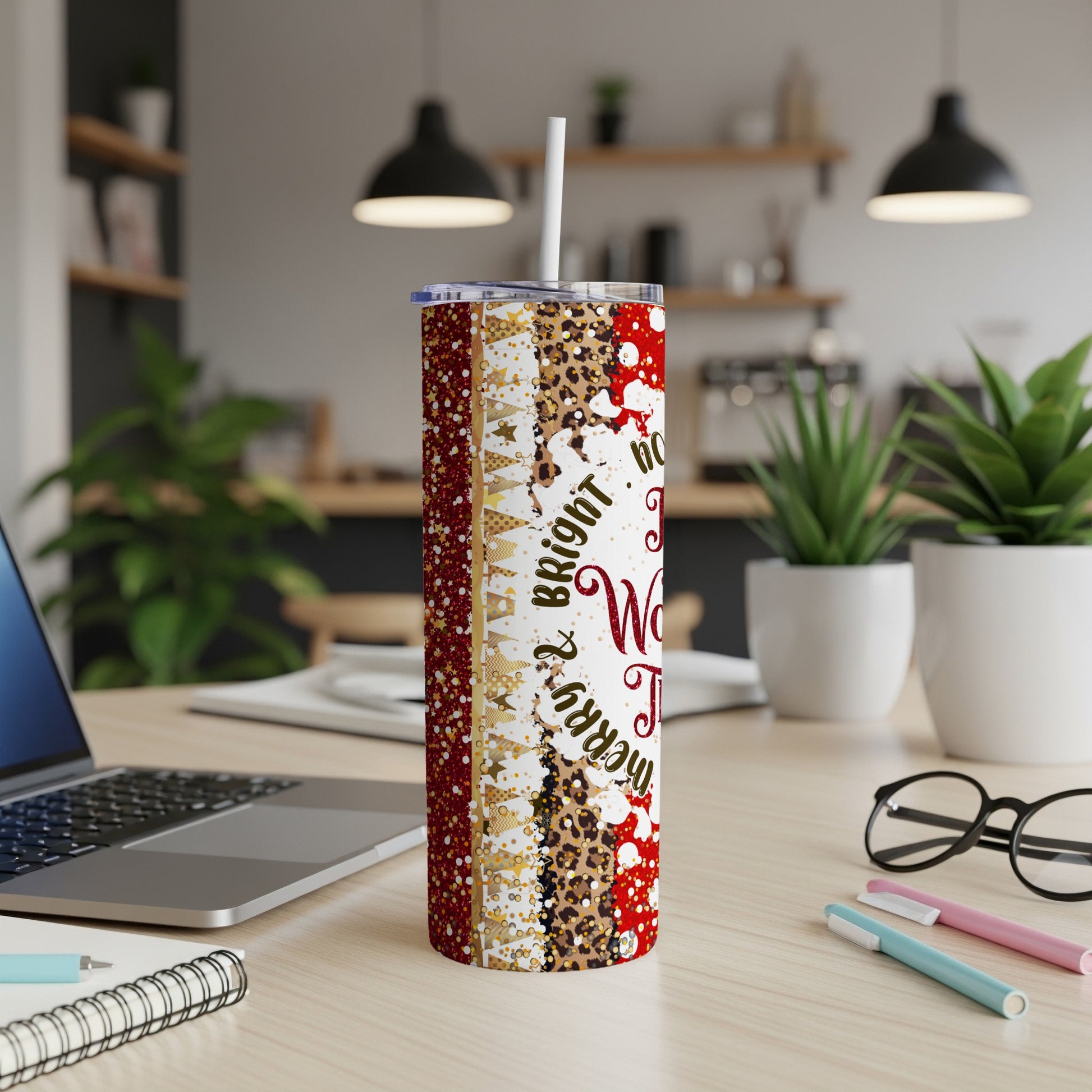 Patterned tumbler with "Merry & Bright" text, featuring festive holiday designs.