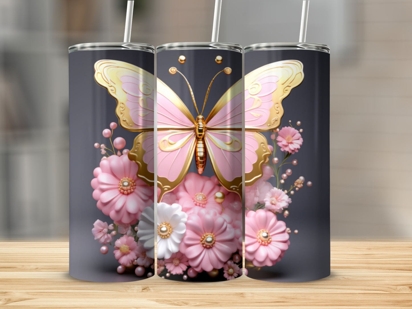 Pink and gold butterfly on floral background on three tumblers.