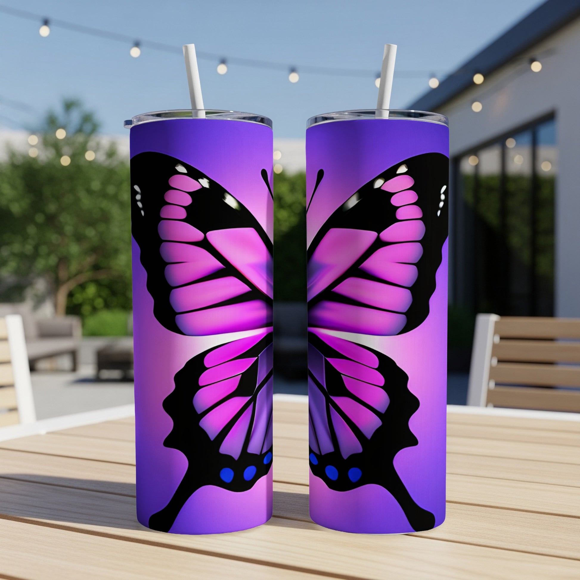 Two tumblers featuring a large pink and purple butterfly design with blue accents.
