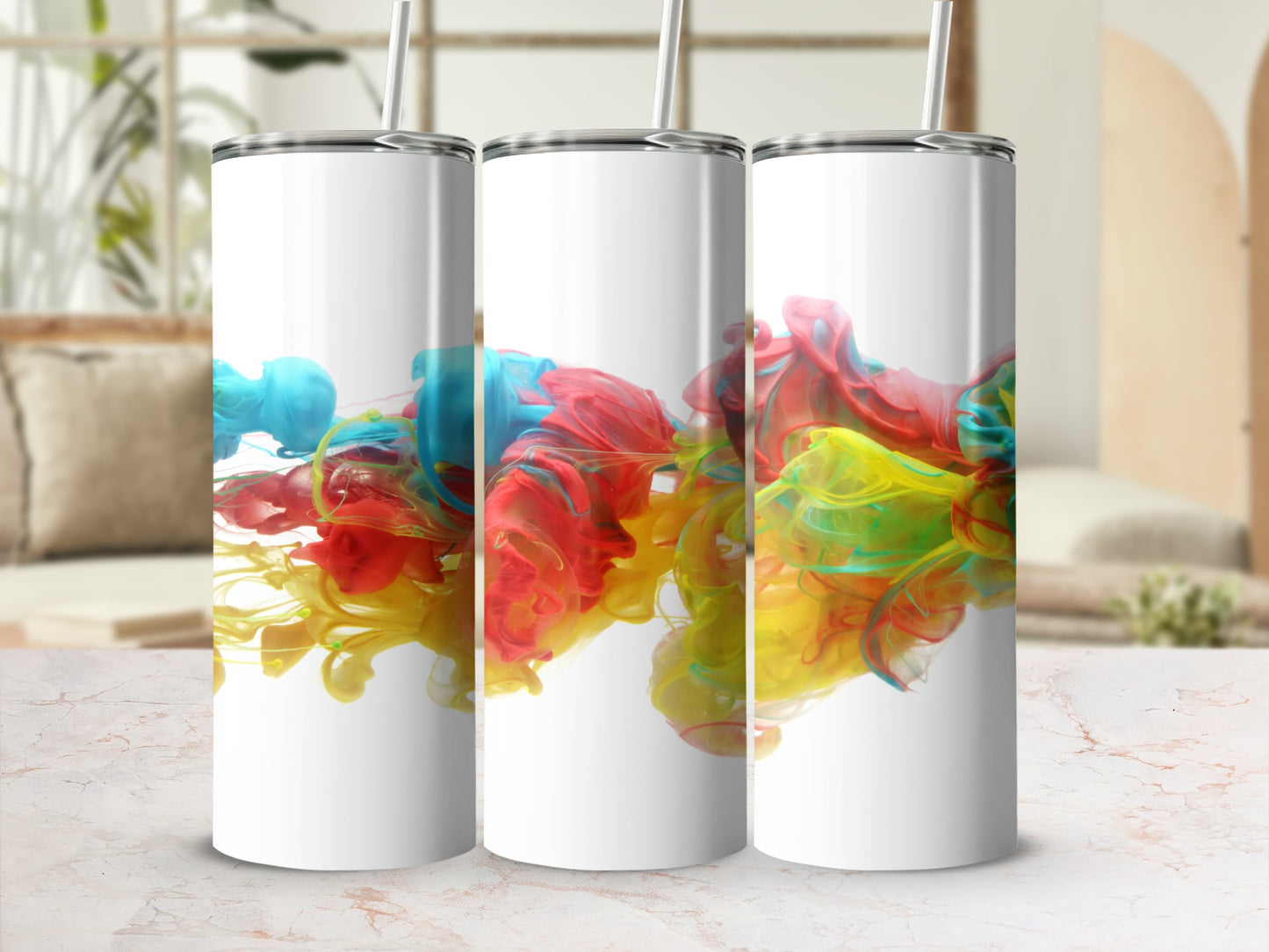 Three white tumblers with colorful abstract paint swirls.