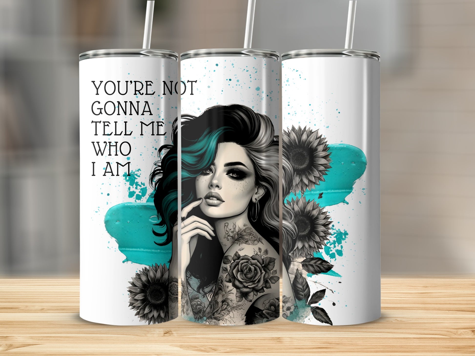 Tumbler with woman artwork, sunflowers, and text "You're Not Gonna Tell Me Who I Am".