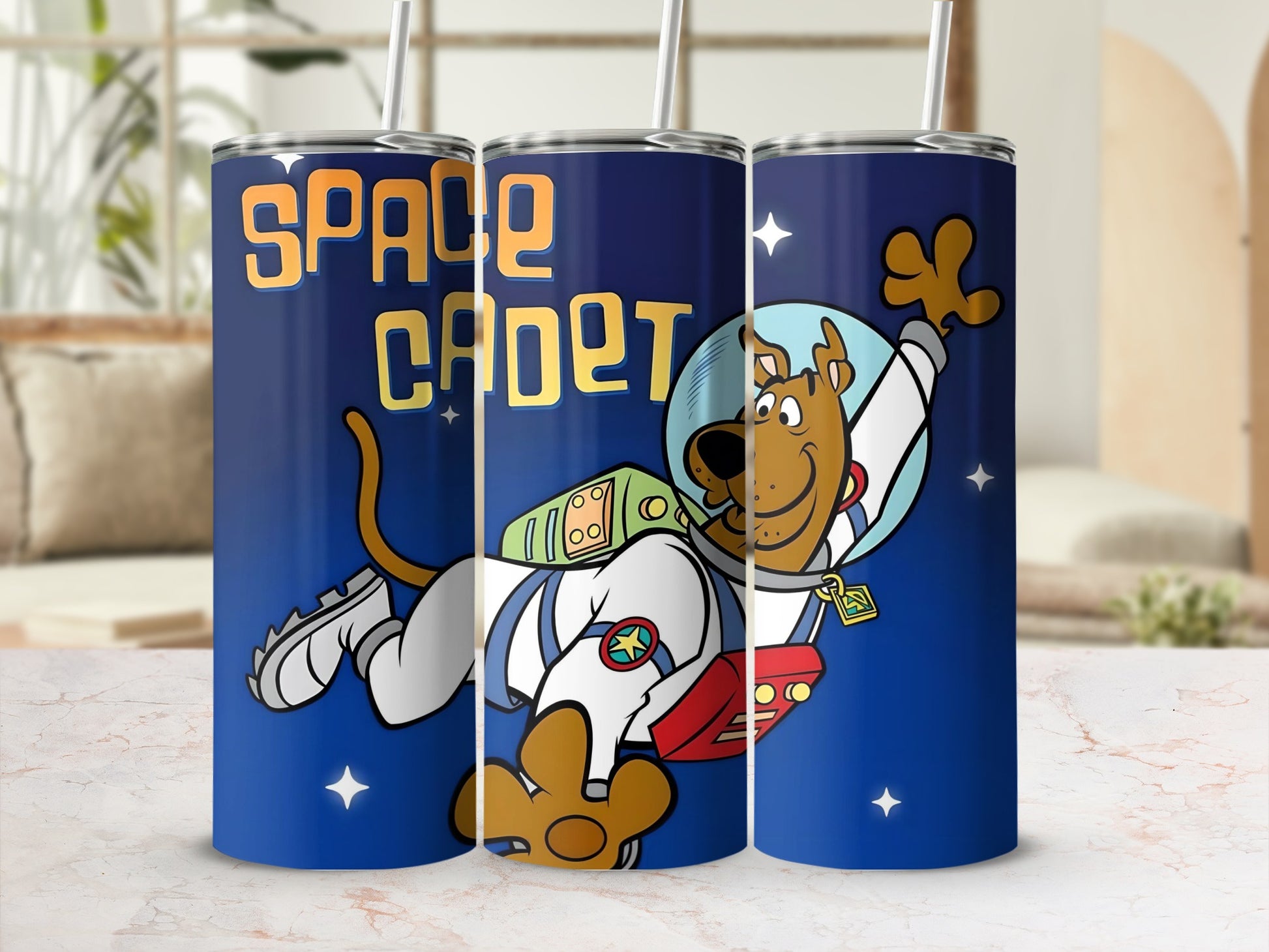 Scooby-Doo as a space cadet on a blue tumbler with stars.