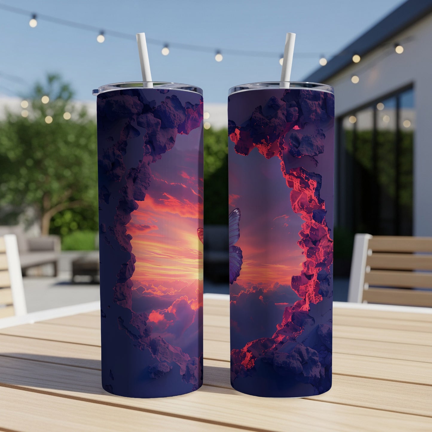 Two tumblers with a sunset cloud and butterfly graphic.