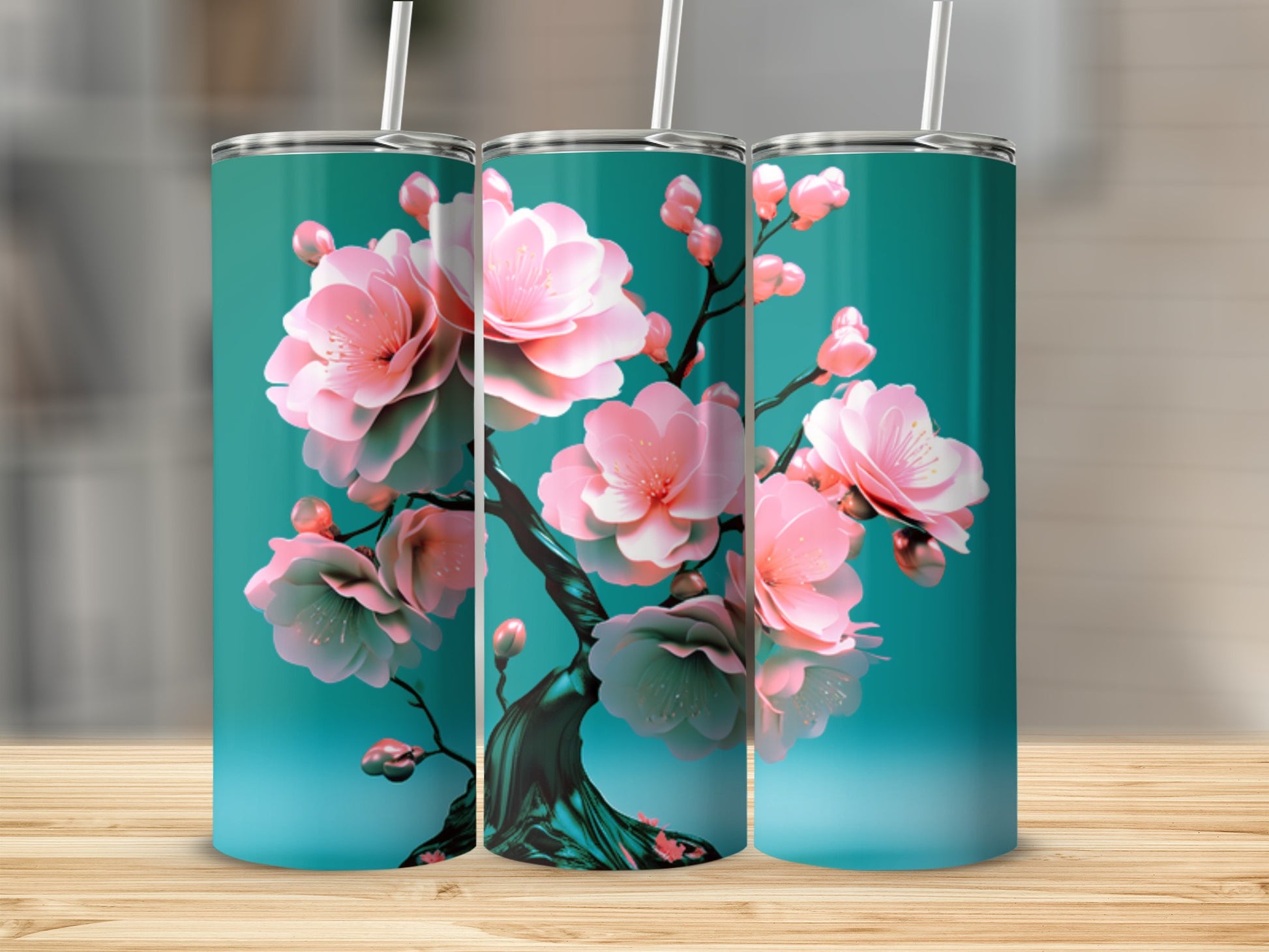 Three teal tumblers featuring pink cherry blossoms on a dark branch.
