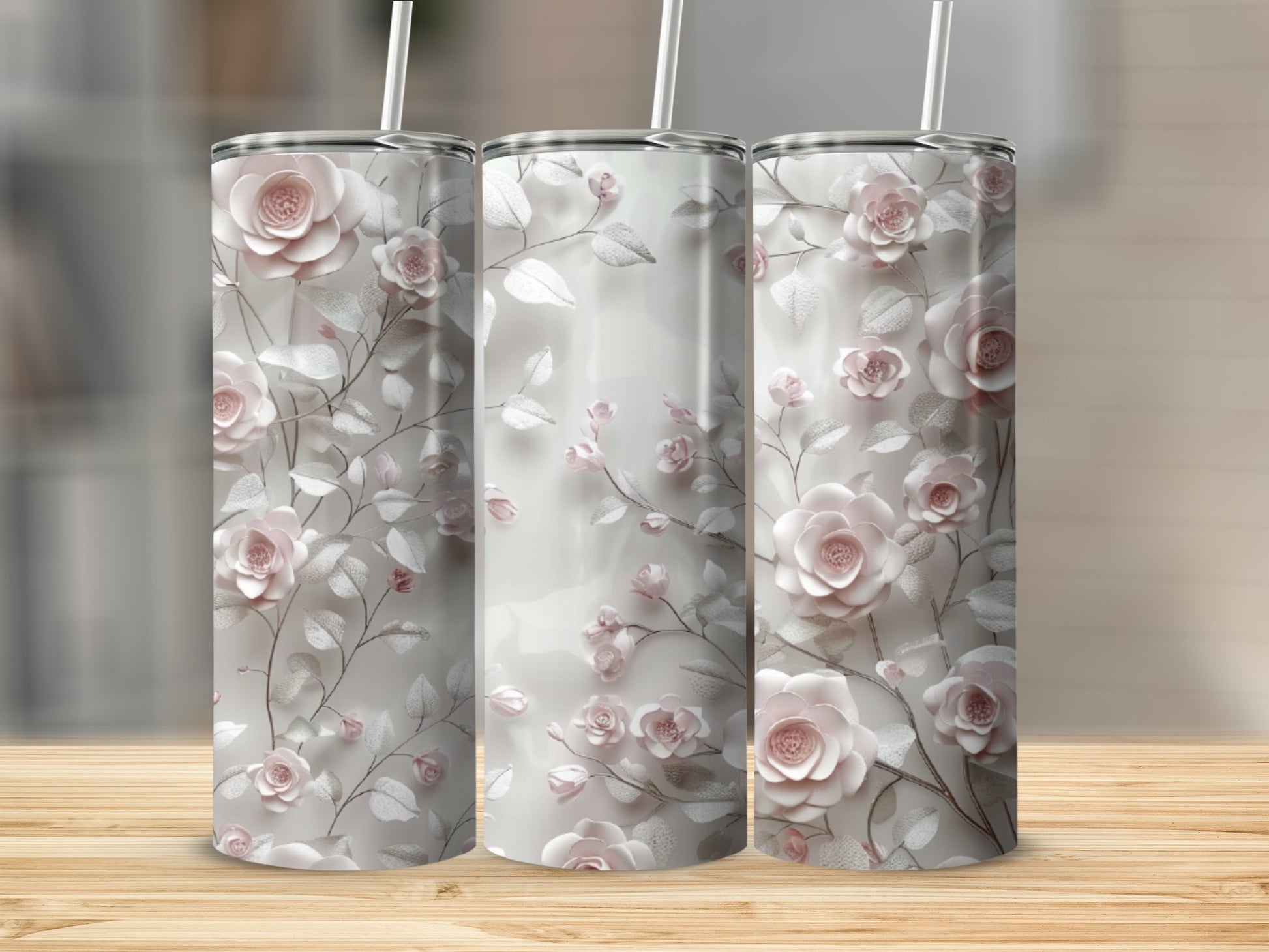 Three tumblers with pink roses and leafy vine pattern.