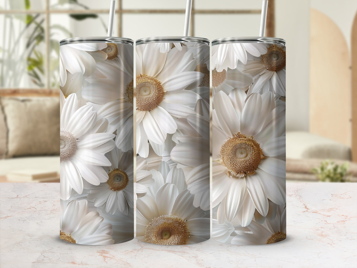 Three tumblers with a white daisy floral pattern.