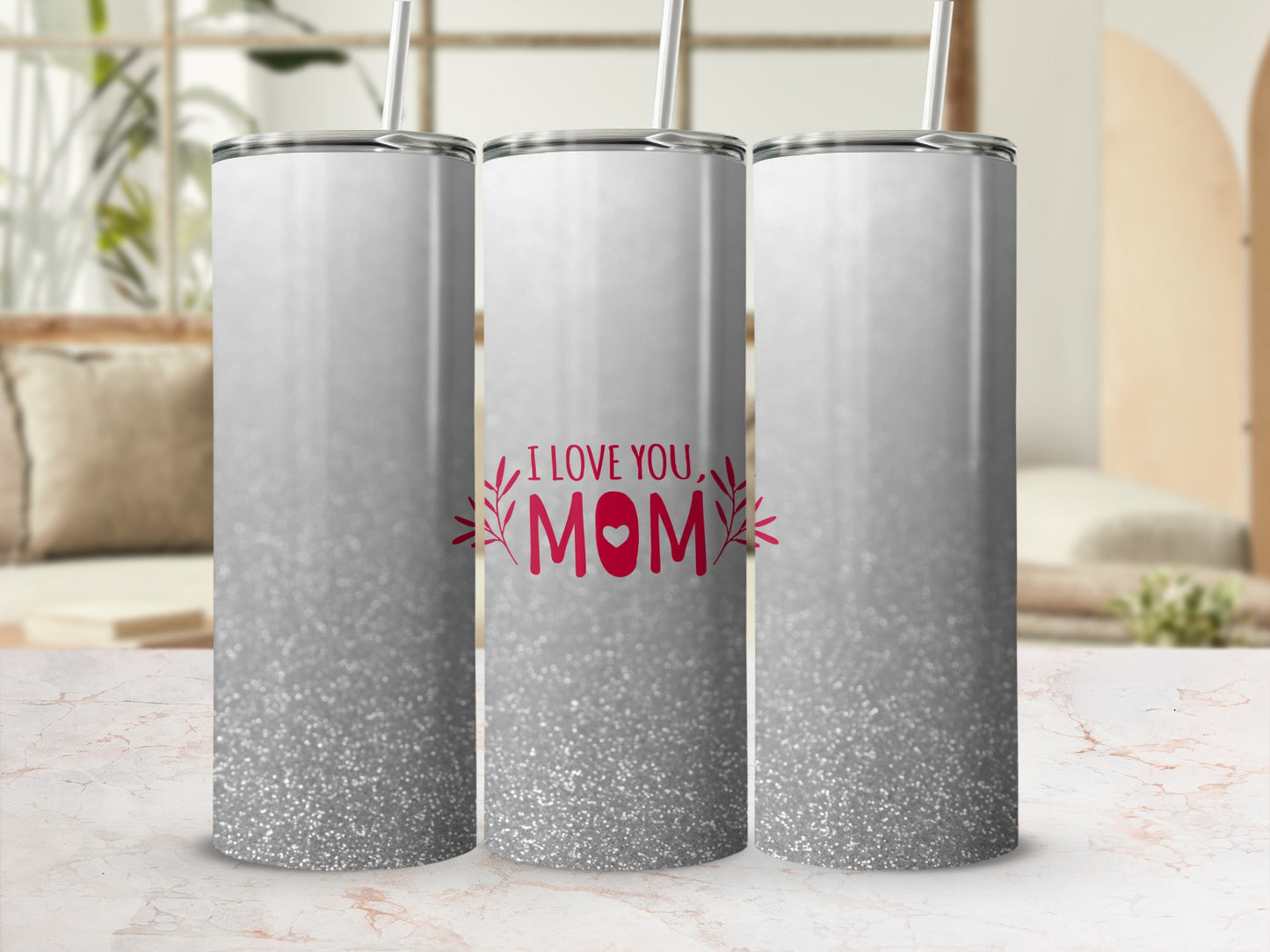 Silver glitter tumbler with "I LOVE YOU, MOM" text and heart design.